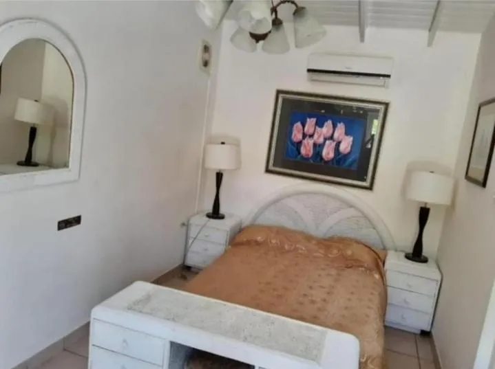 Photo of the whole room, Bed in YOUR FIRST DAY Hotel on Aruba