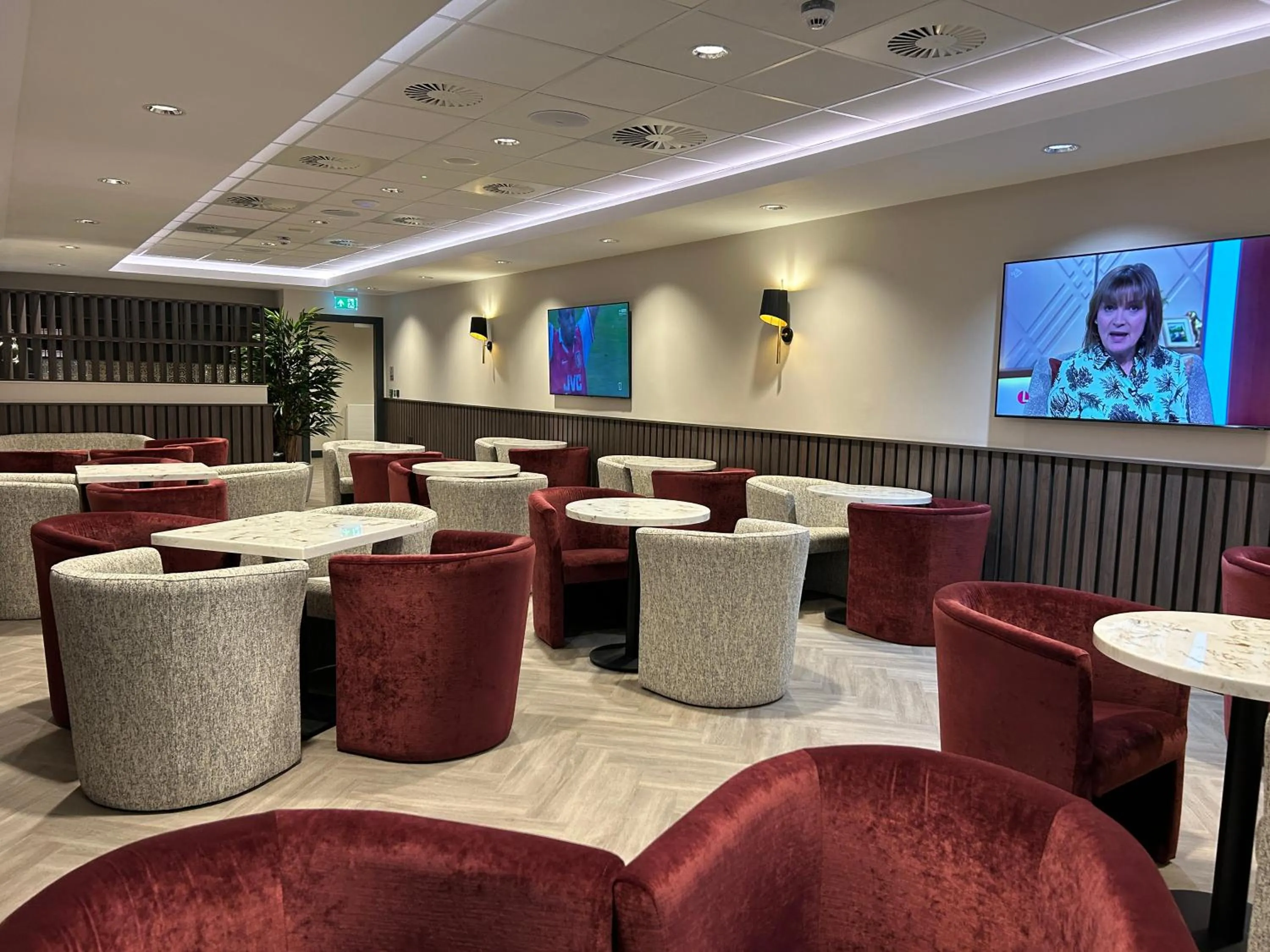 Communal lounge/ TV room in Tynecastle Park Hotel
