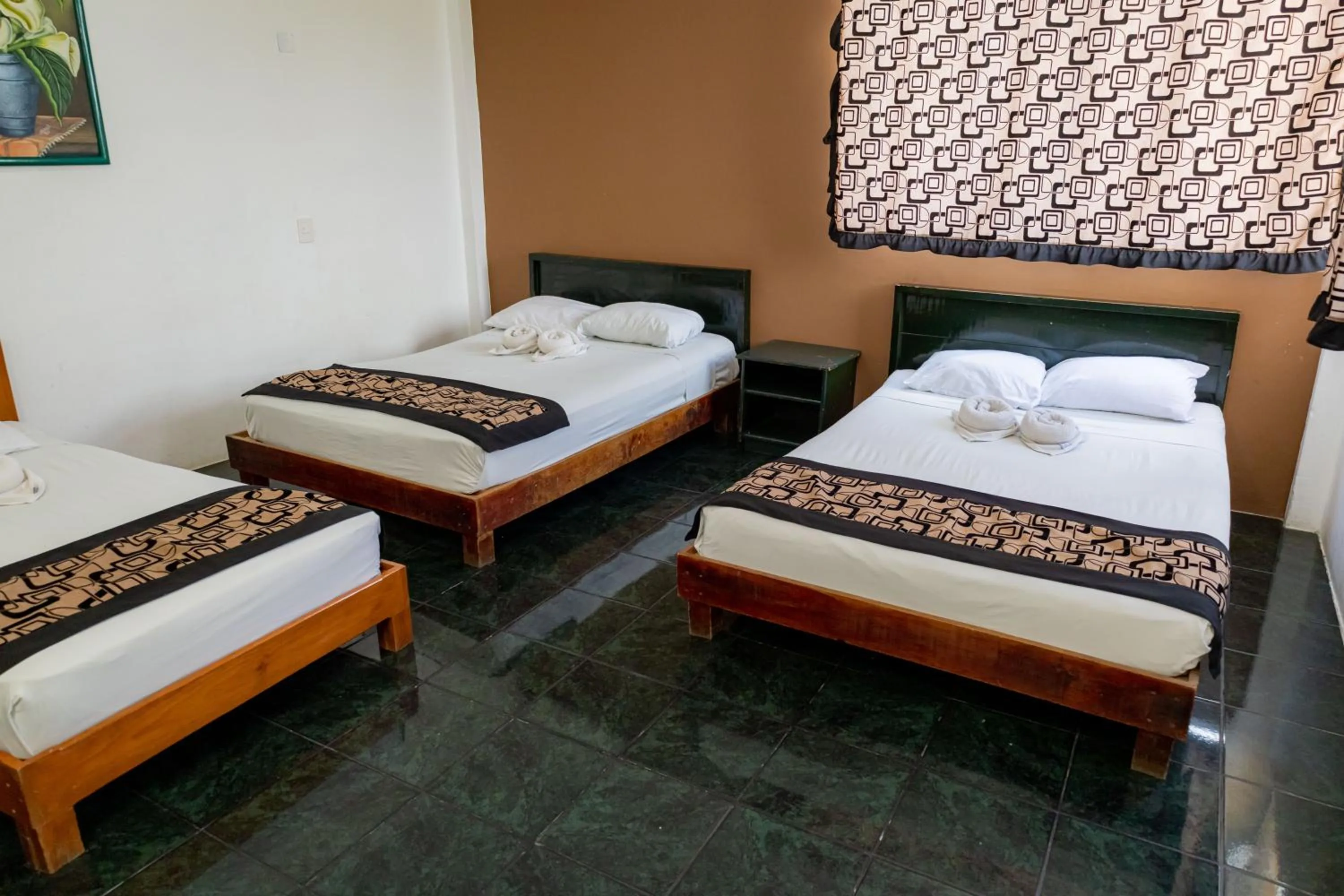 Bed in Hotel Las Palmas Cancun Centro