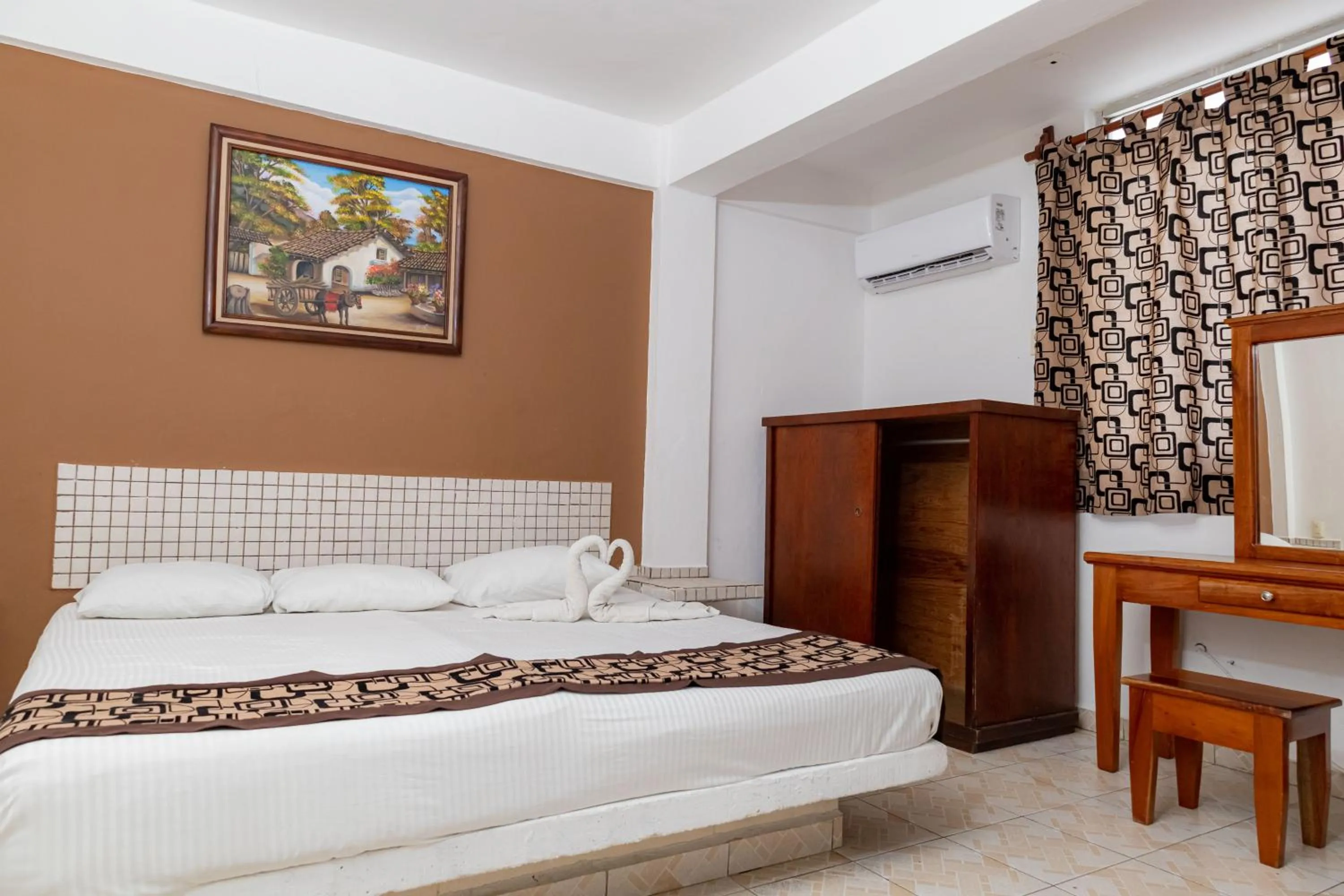 Bed in Hotel Las Palmas Cancun Centro