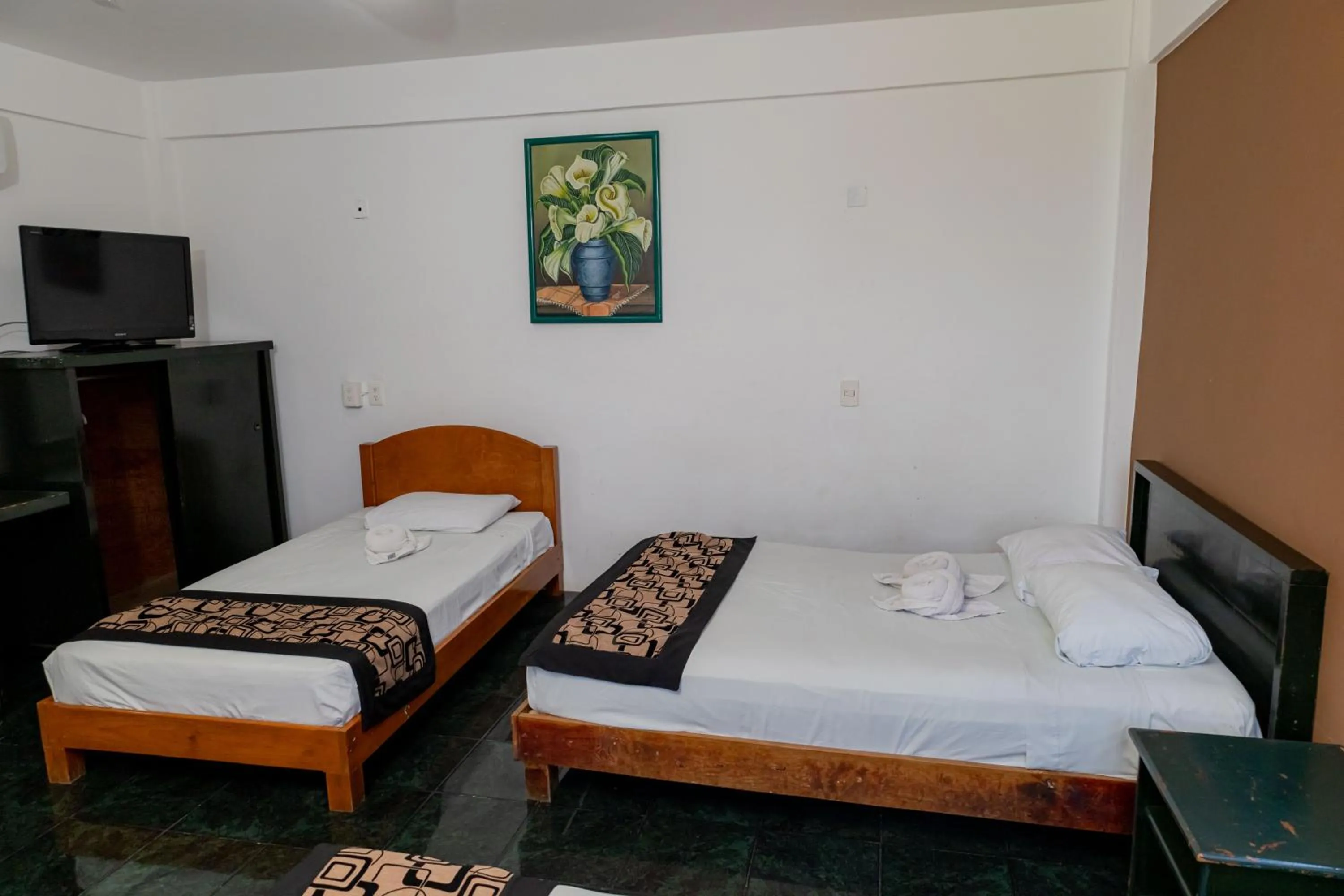 Bed in Hotel Las Palmas Cancun Centro