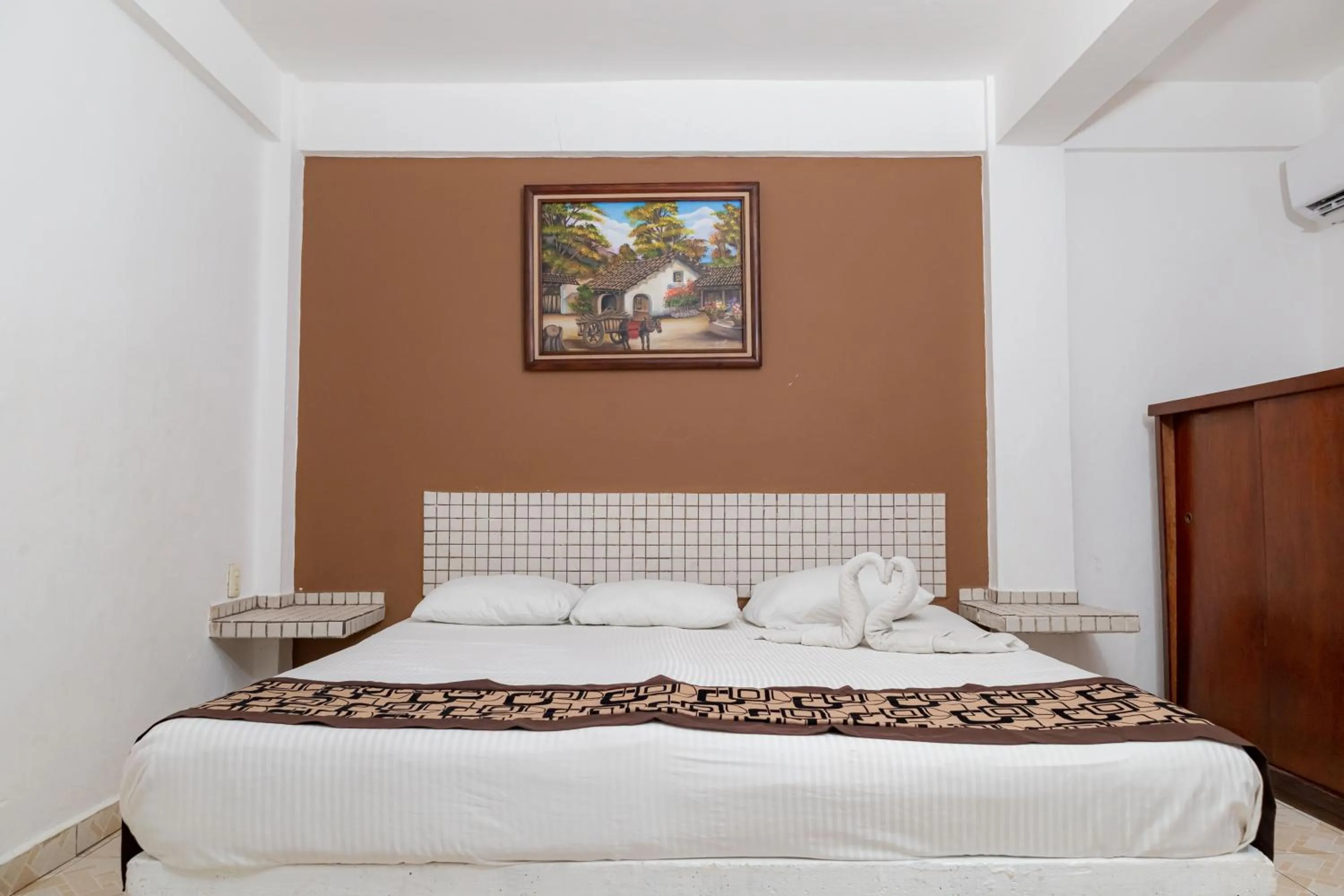 Bed in Hotel Las Palmas Cancun Centro