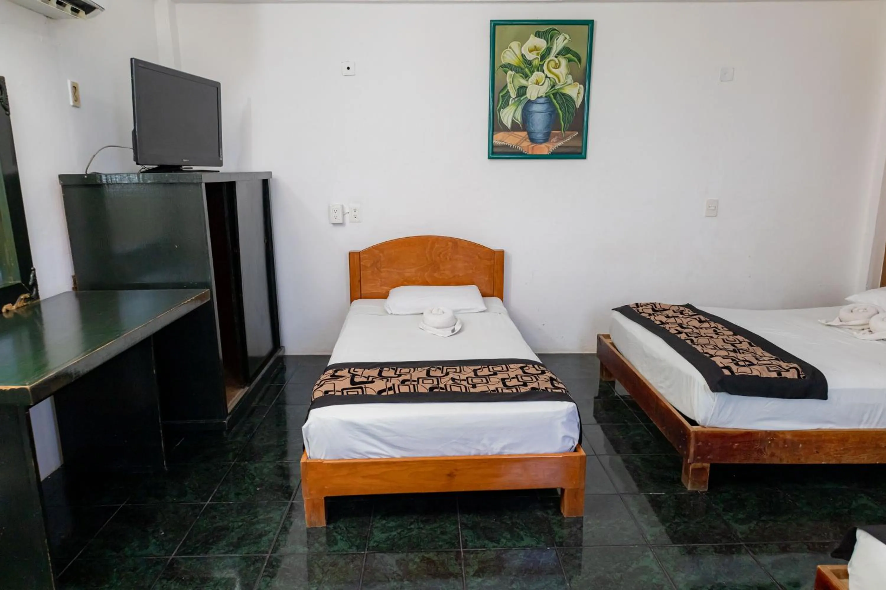 Bed in Hotel Las Palmas Cancun Centro