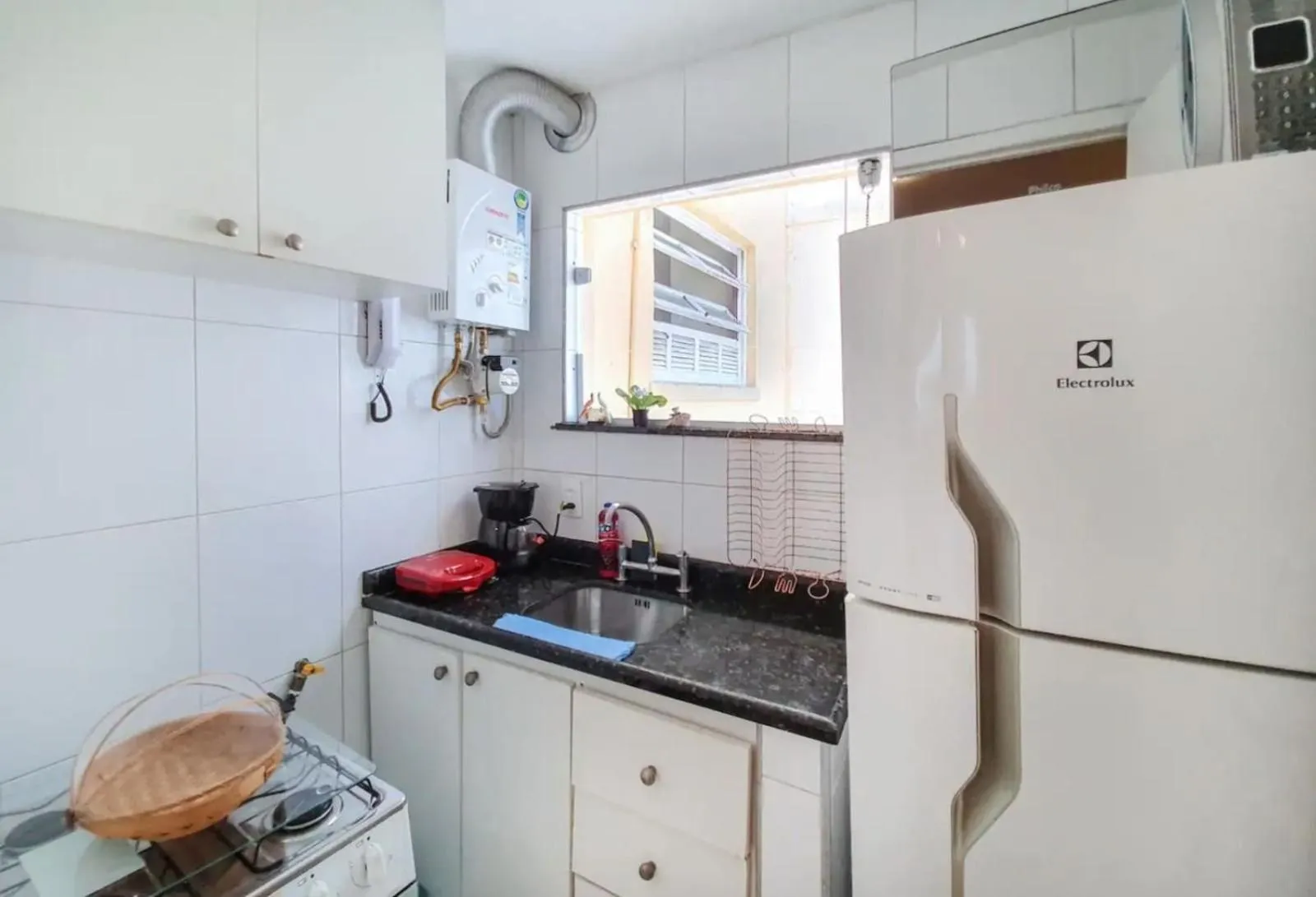 Kitchen or kitchenette in Copacabana Aconchegante a 3 min da Praia