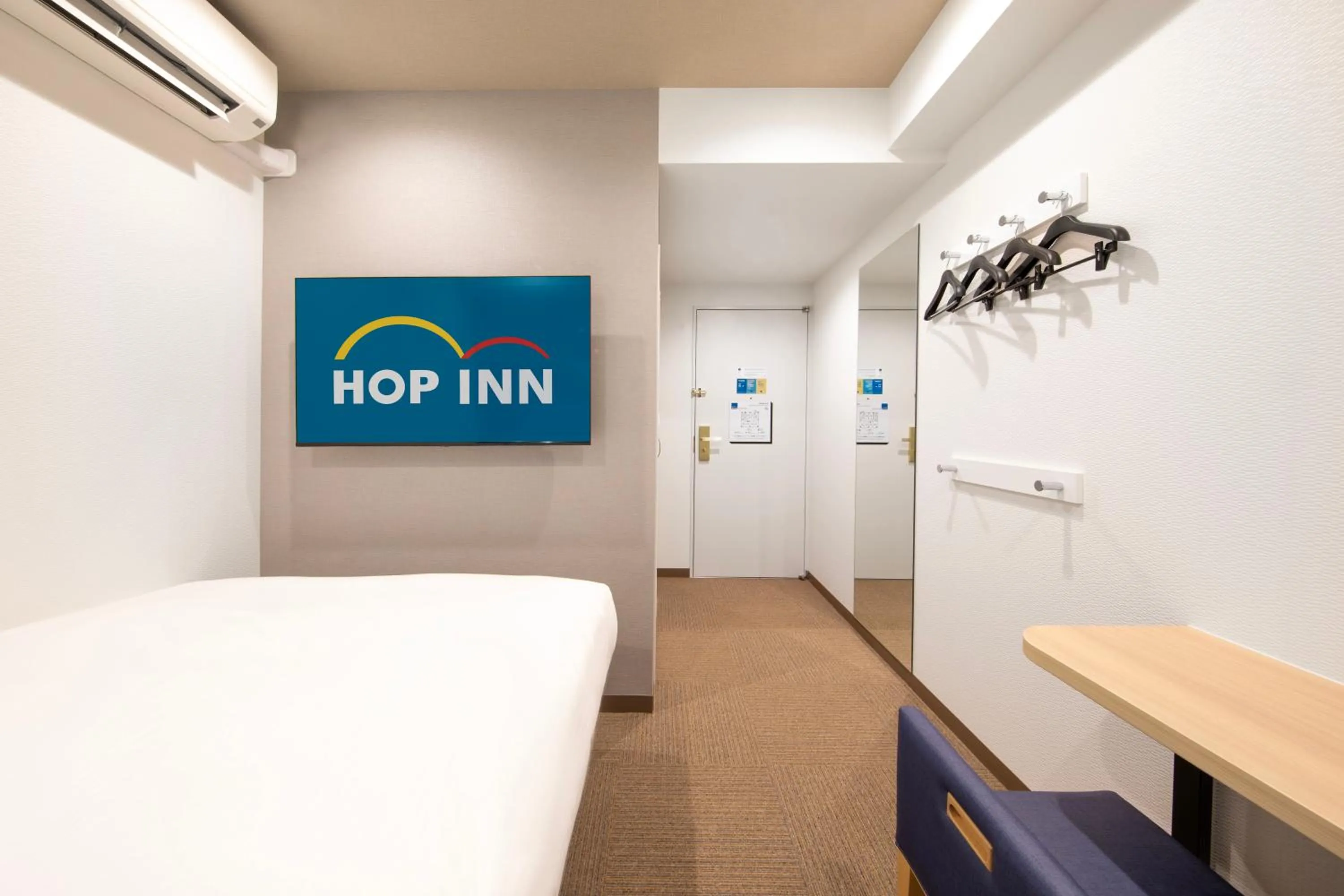 Bed in Hop Inn Tokyo Iidabashi