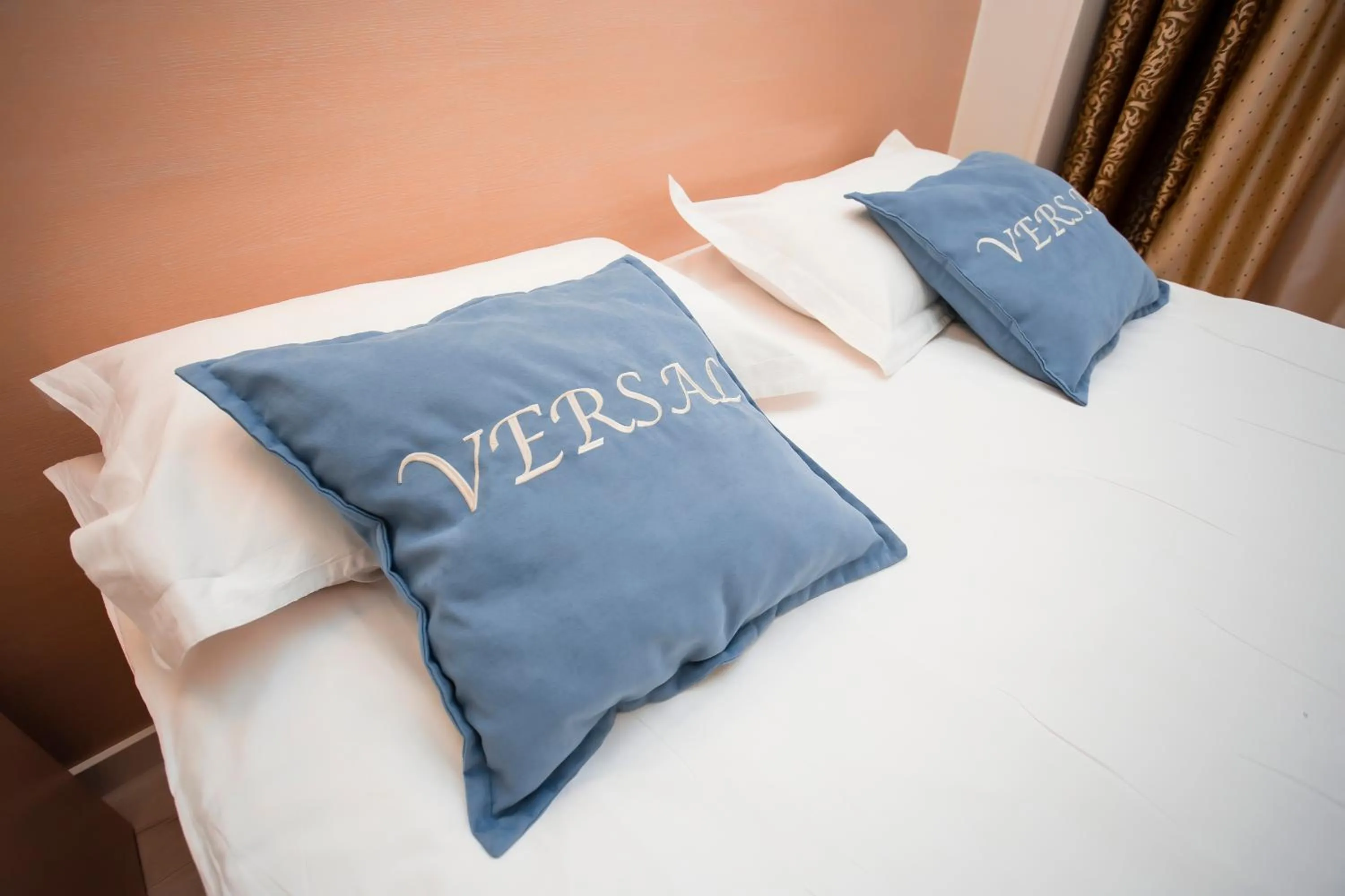 Bed in Versal Hotel