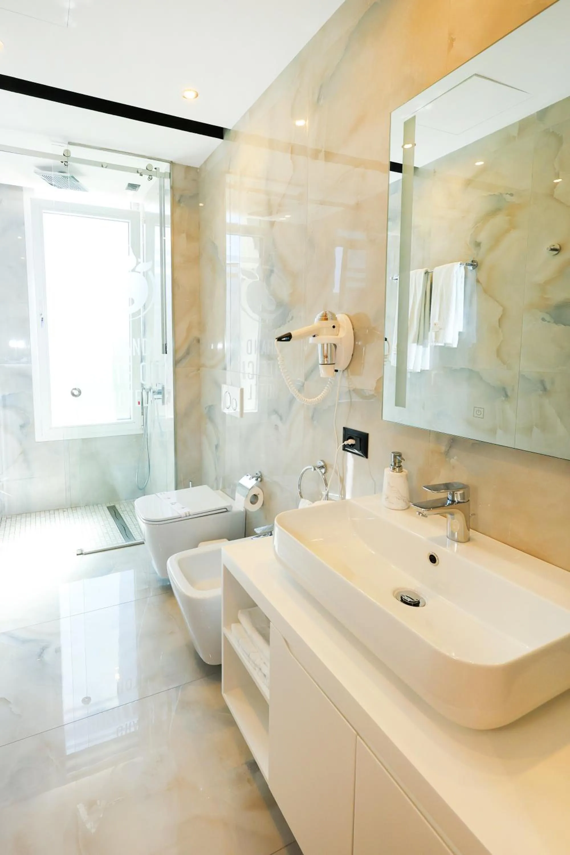 Bathroom in Grand White City Hotel