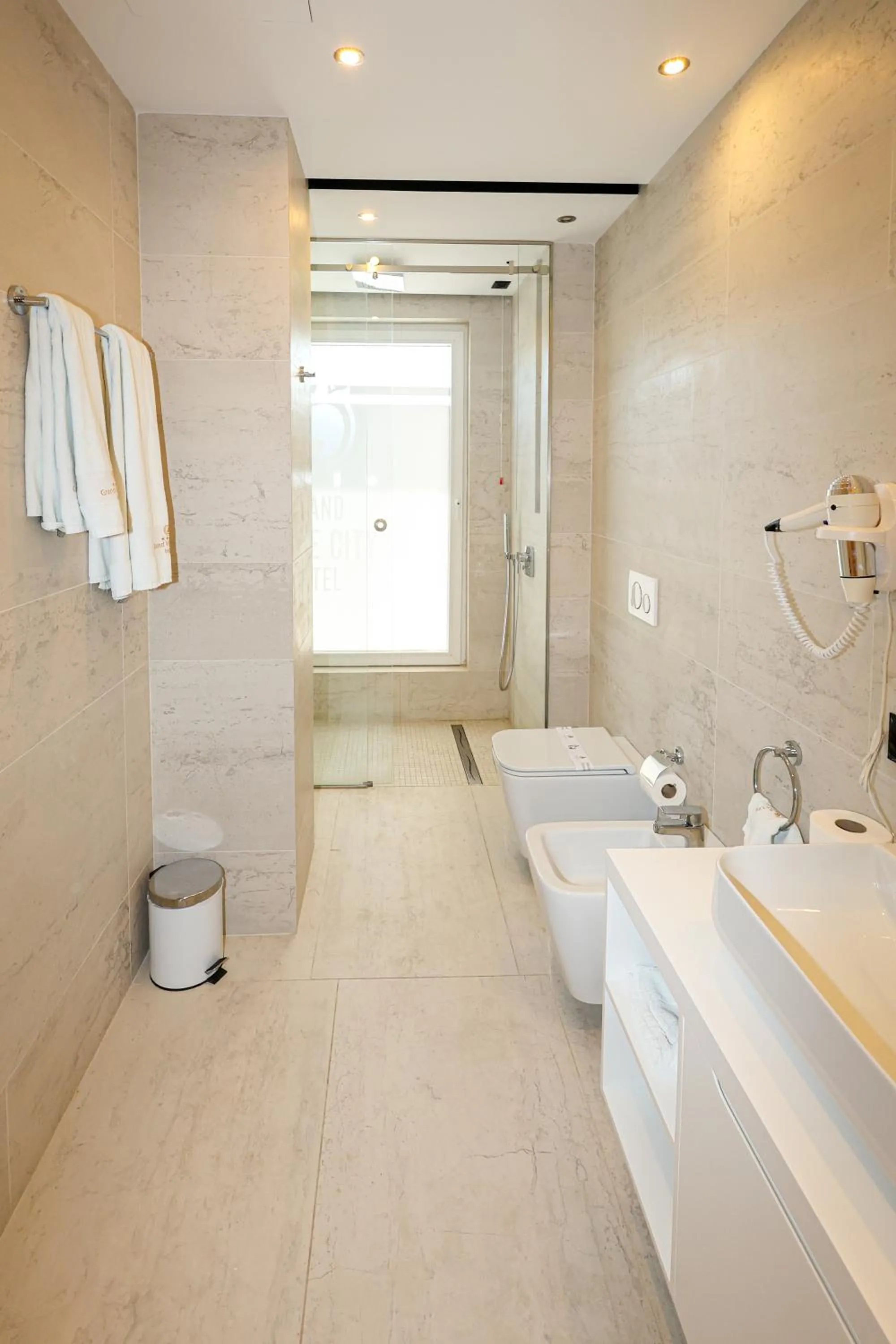 Shower in Grand White City Hotel