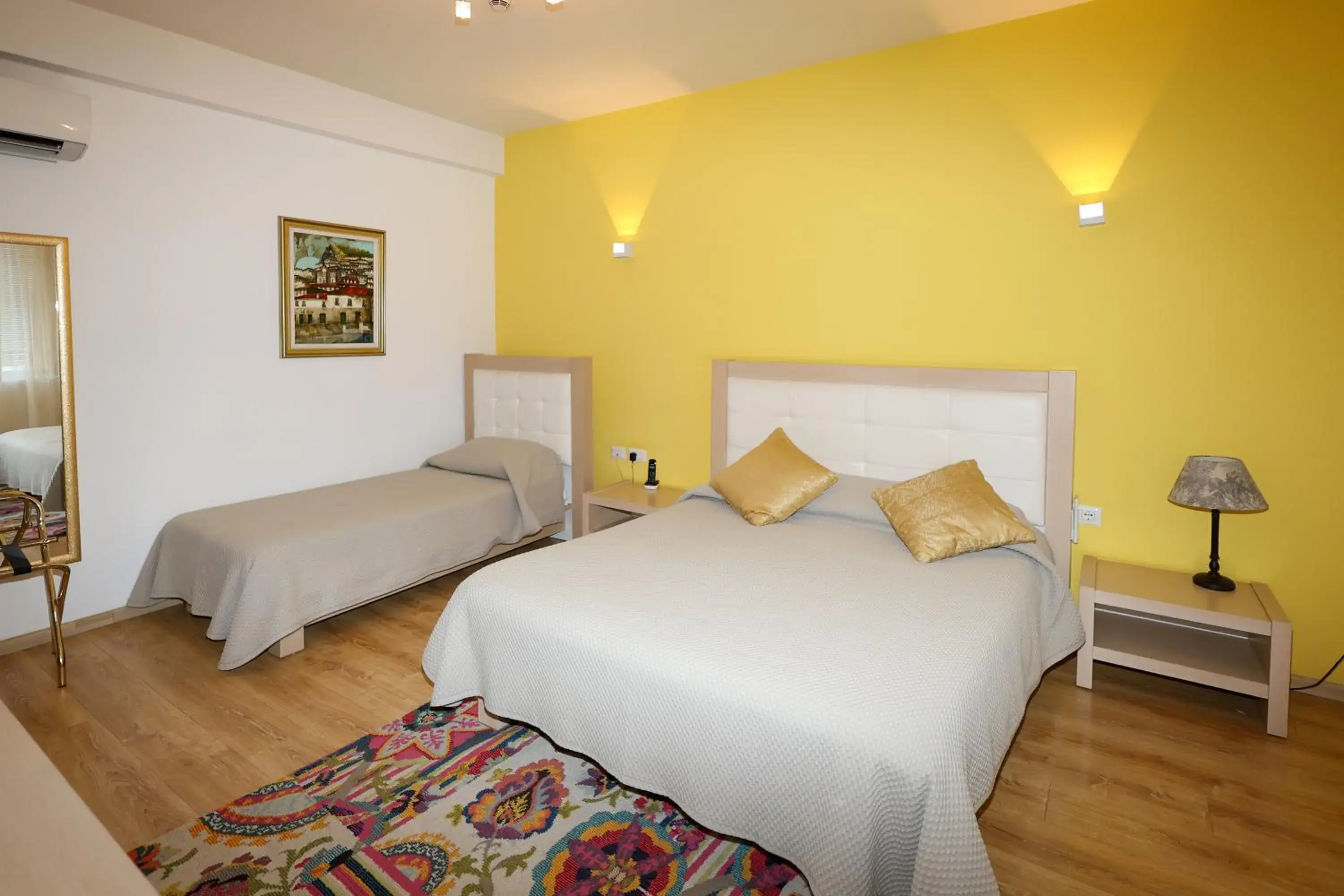 Economy Quadruple Room in Grand White City Hotel Economy Quadruple Room in Grand White City Hotel