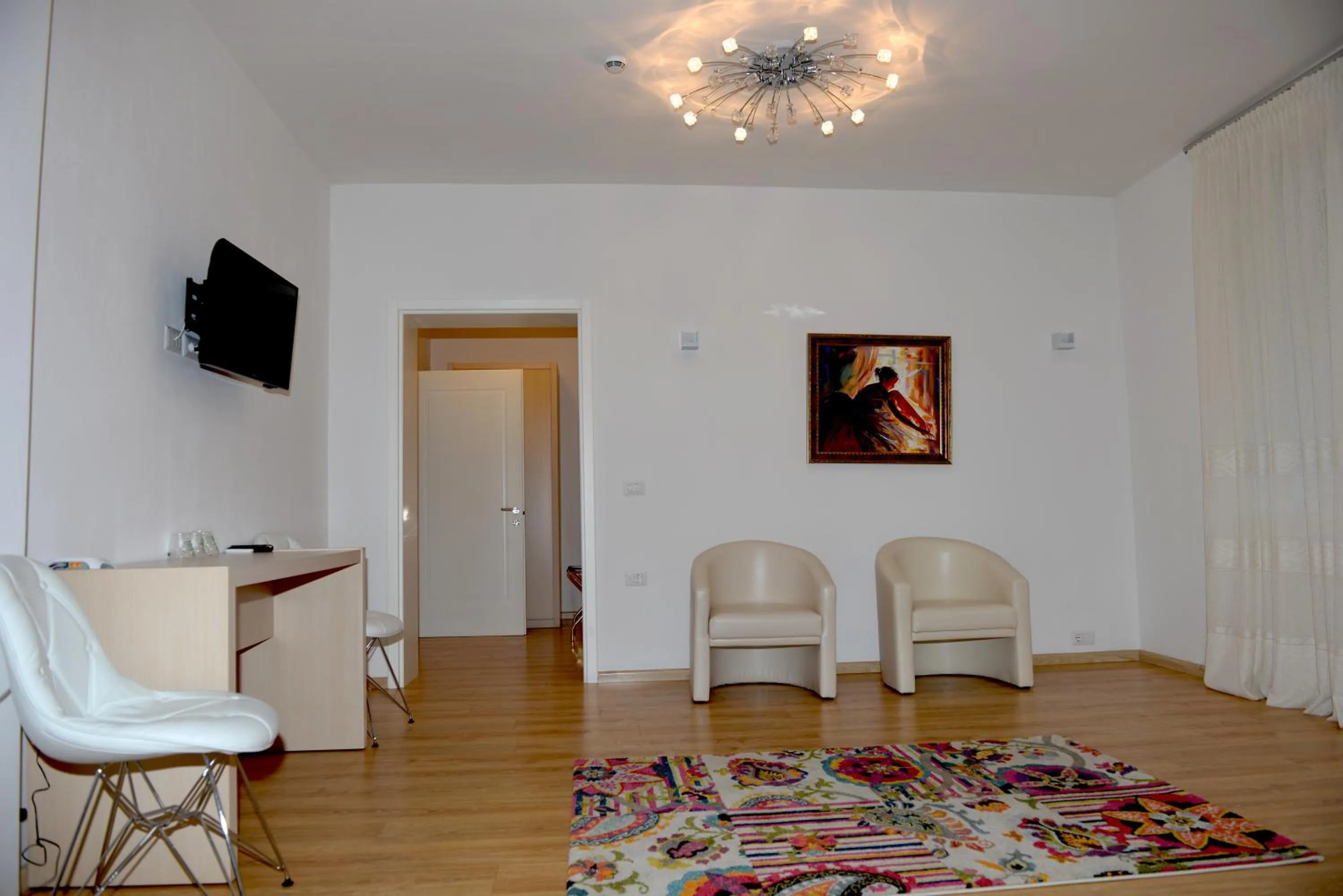 Photo of the whole room in Grand White City Hotel