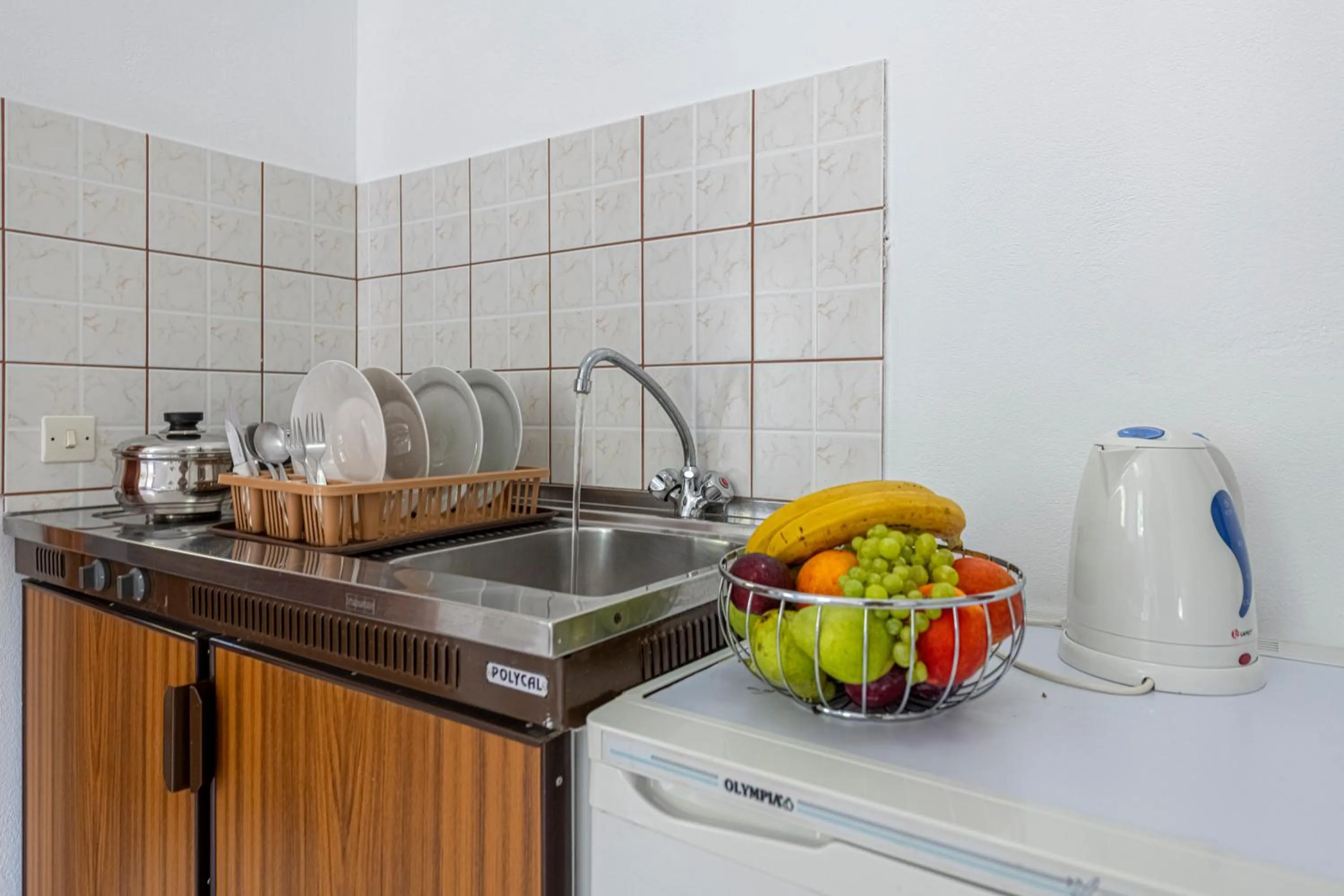 Kitchen or kitchenette in Faro Del Porto