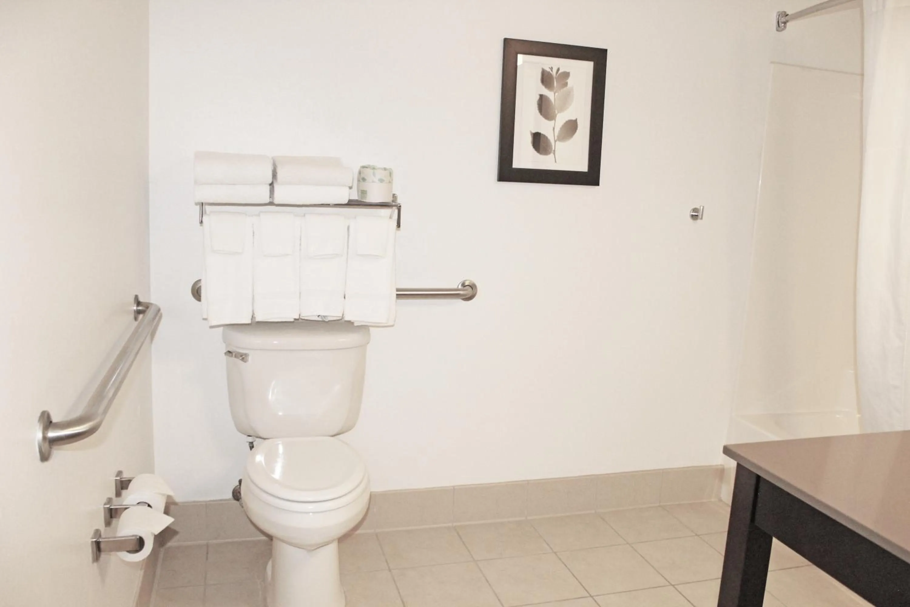 Toilet in Independence Stay Hotel & Suites