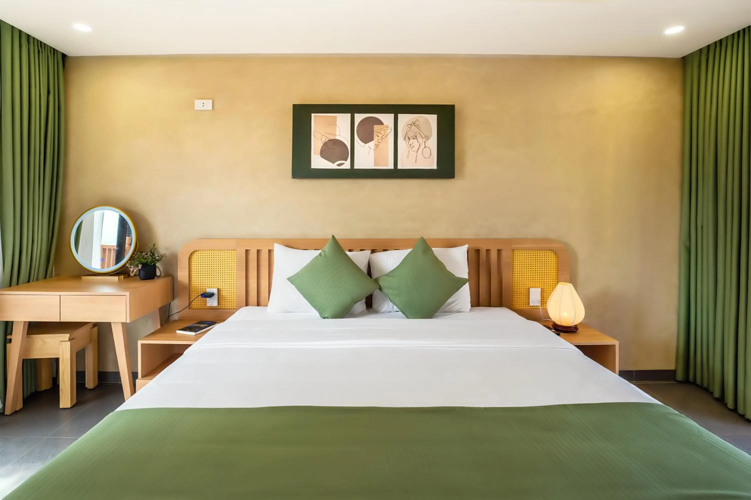 Bed in The Linh Seaside Villa Hoi An