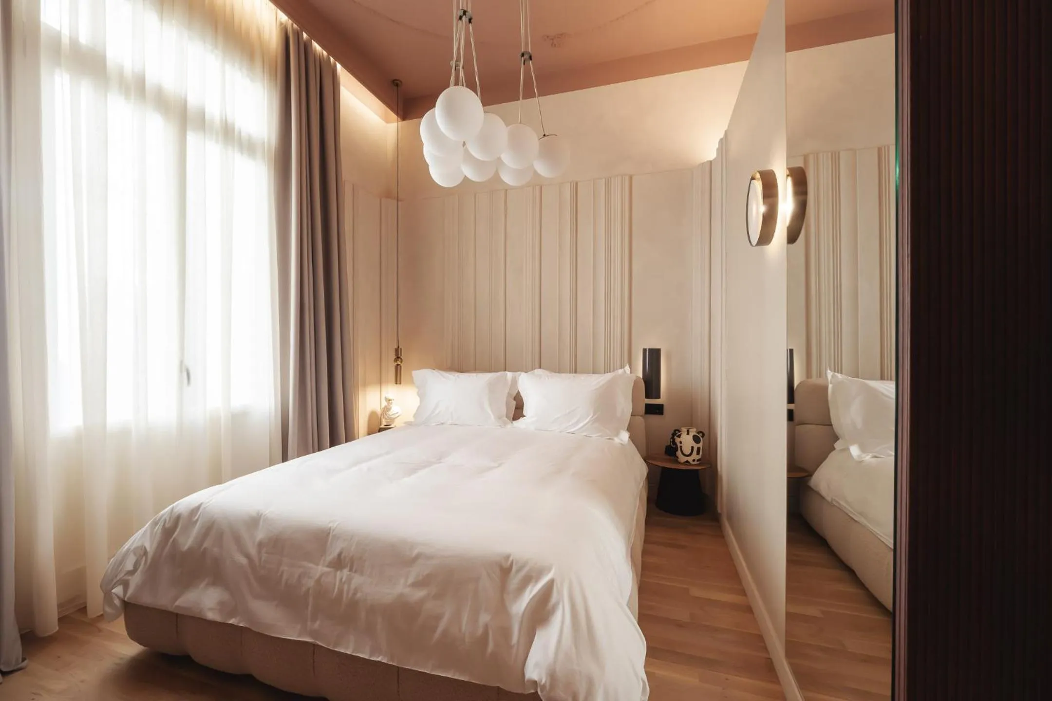 Bed in Zenith Premium Suites