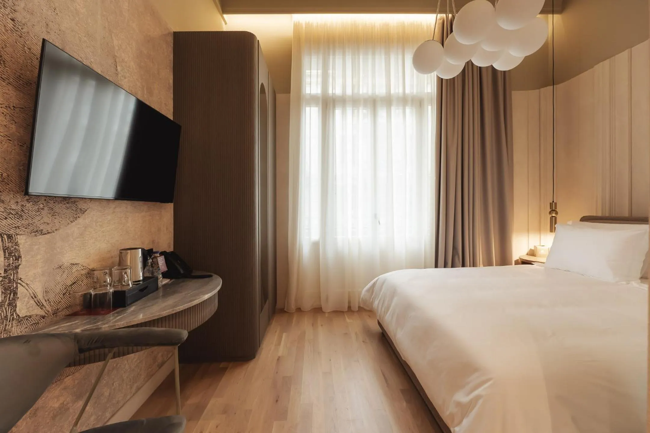 Bed in Zenith Premium Suites