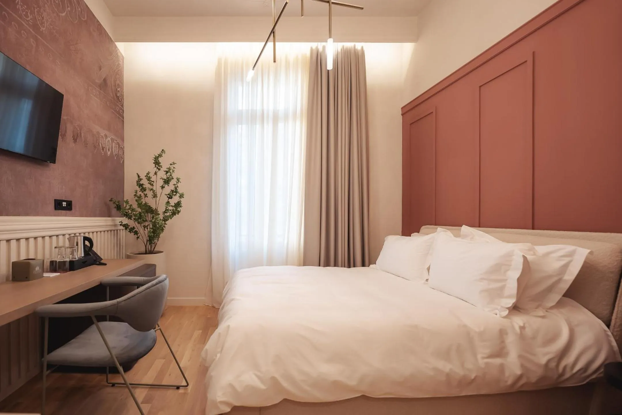 Bed in Zenith Premium Suites