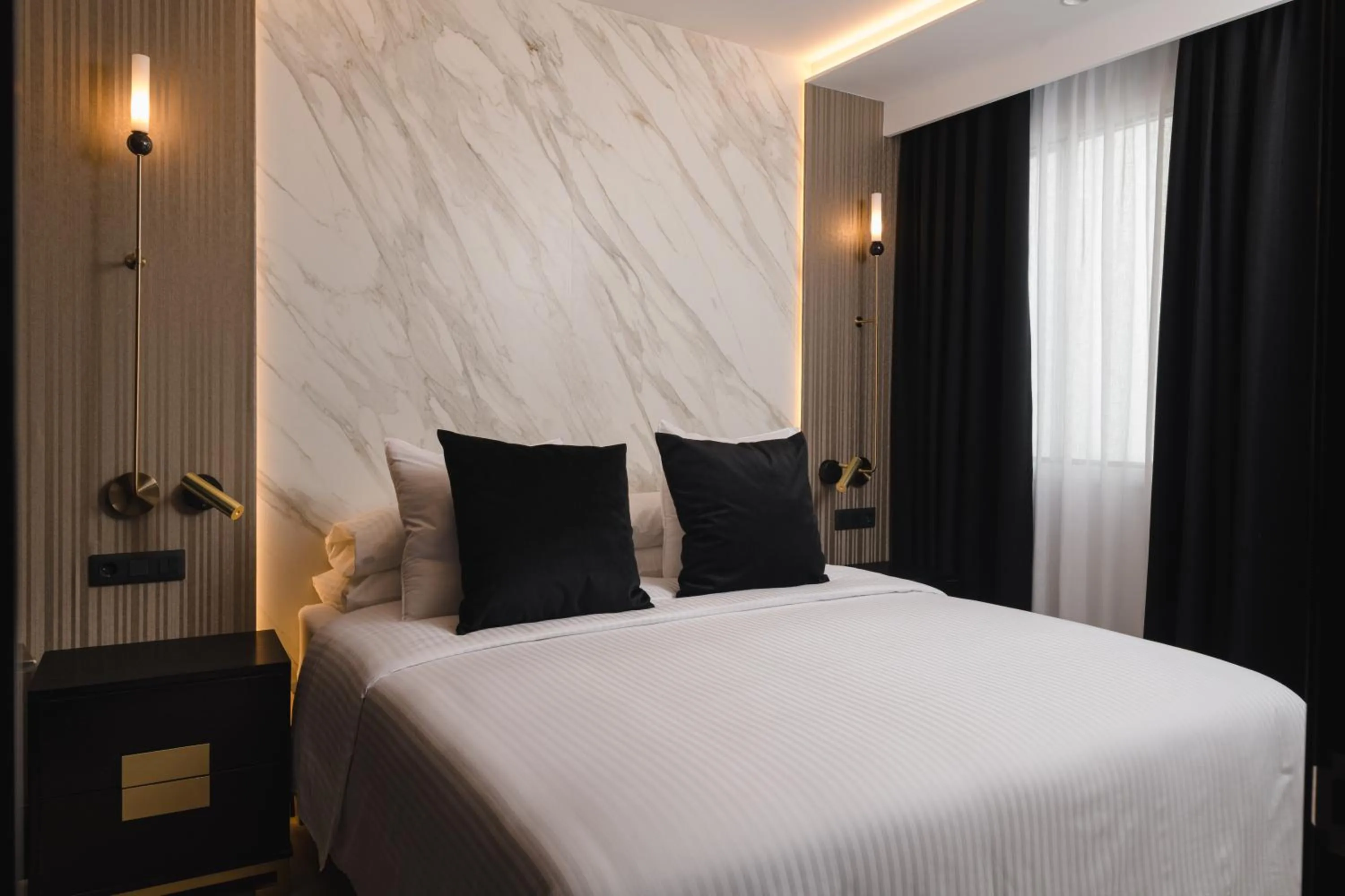 Bed in Blue Marina Suites - Boutique Apartments