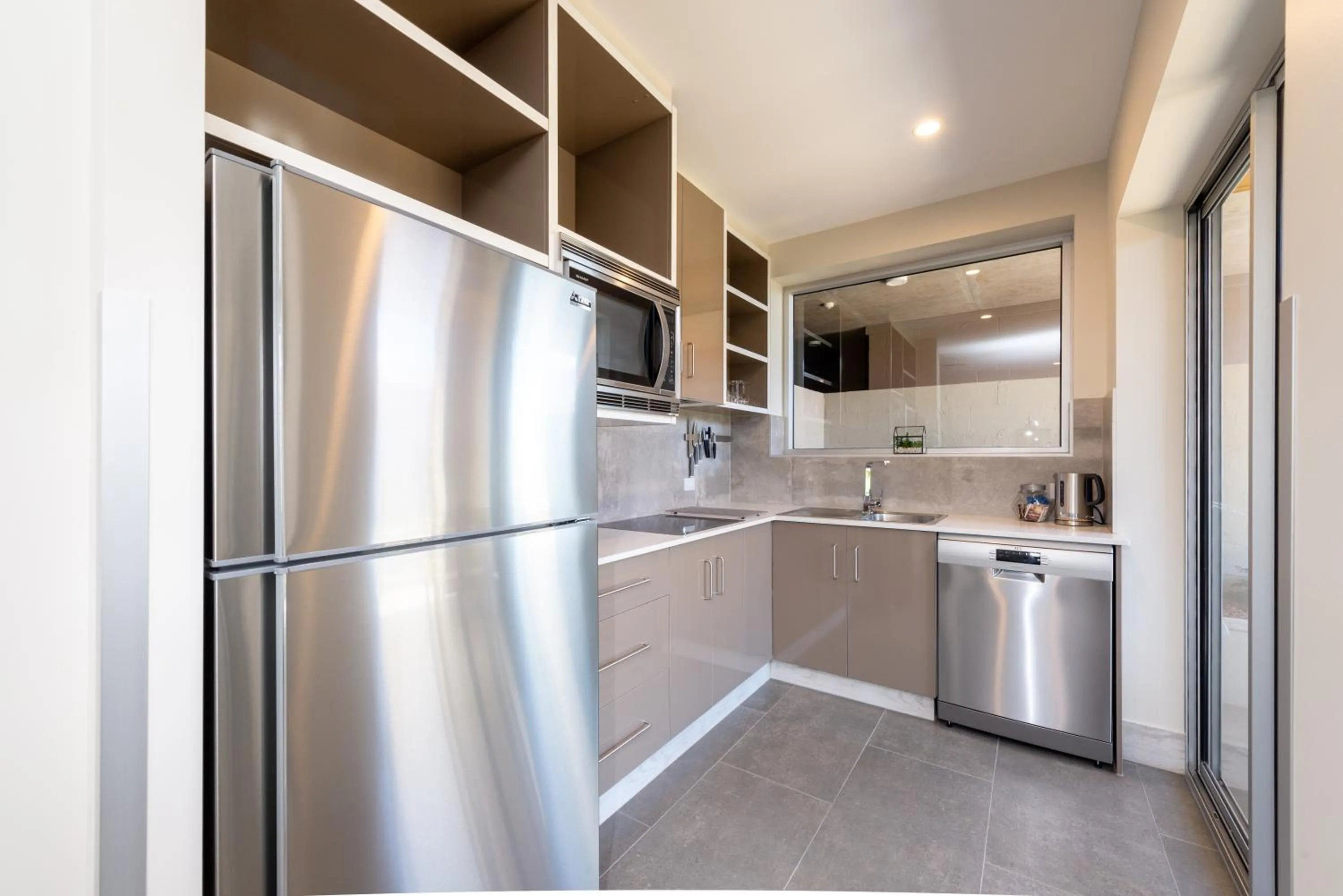 Kitchen or kitchenette in Laguna Serviced Apartments