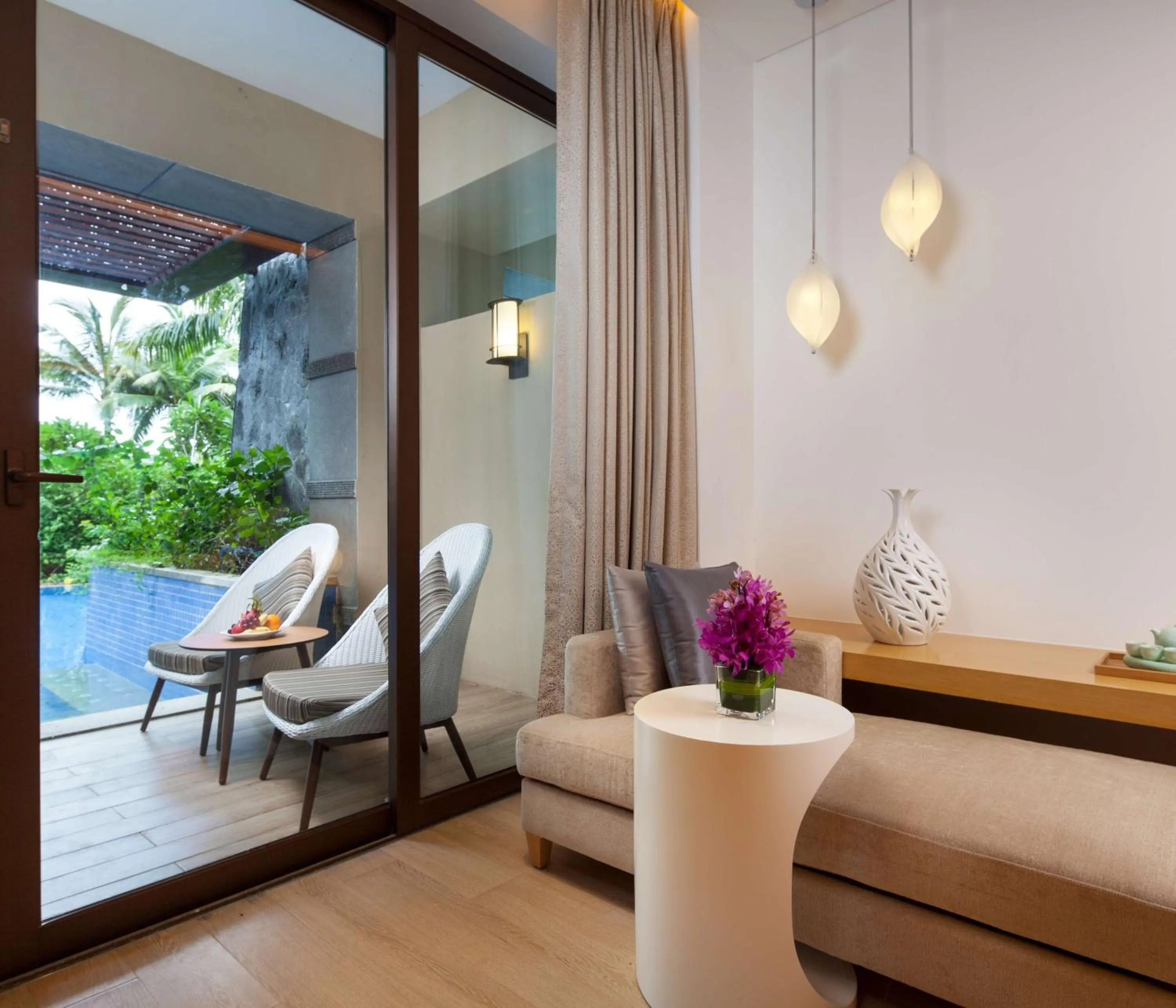 Living room in Sanya Yazhou Bay Resort Curio Collection by Hilton
