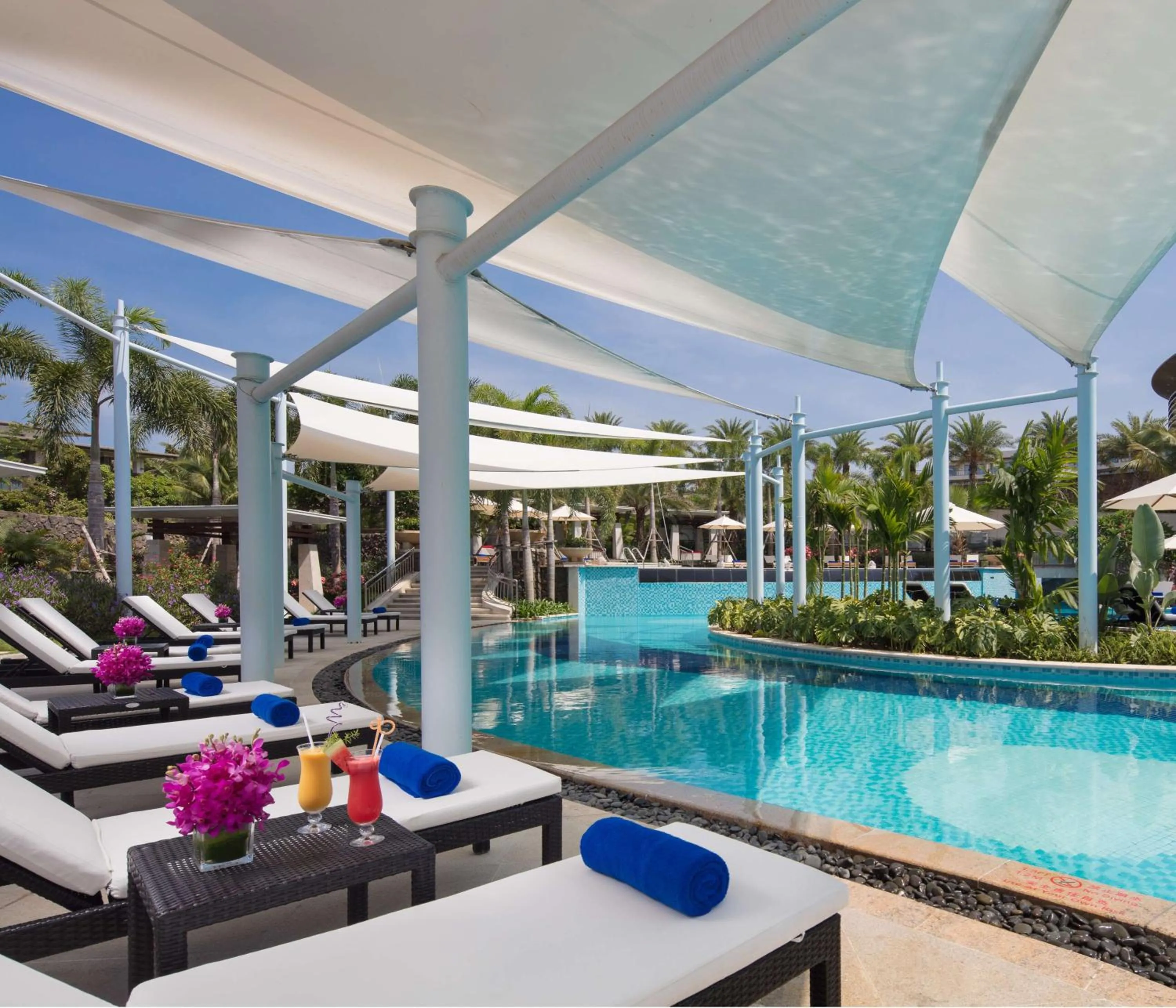 Pool view, Swimming Pool in Sanya Yazhou Bay Resort Curio Collection by Hilton