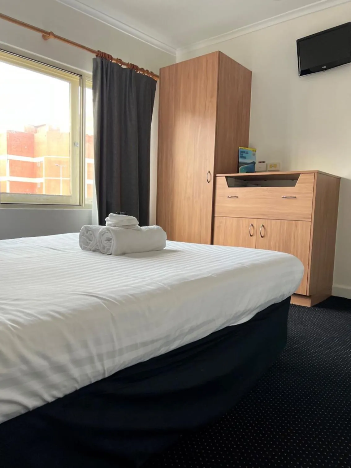 Photo of the whole room, Bed in Star Bar Cafe & Hotel