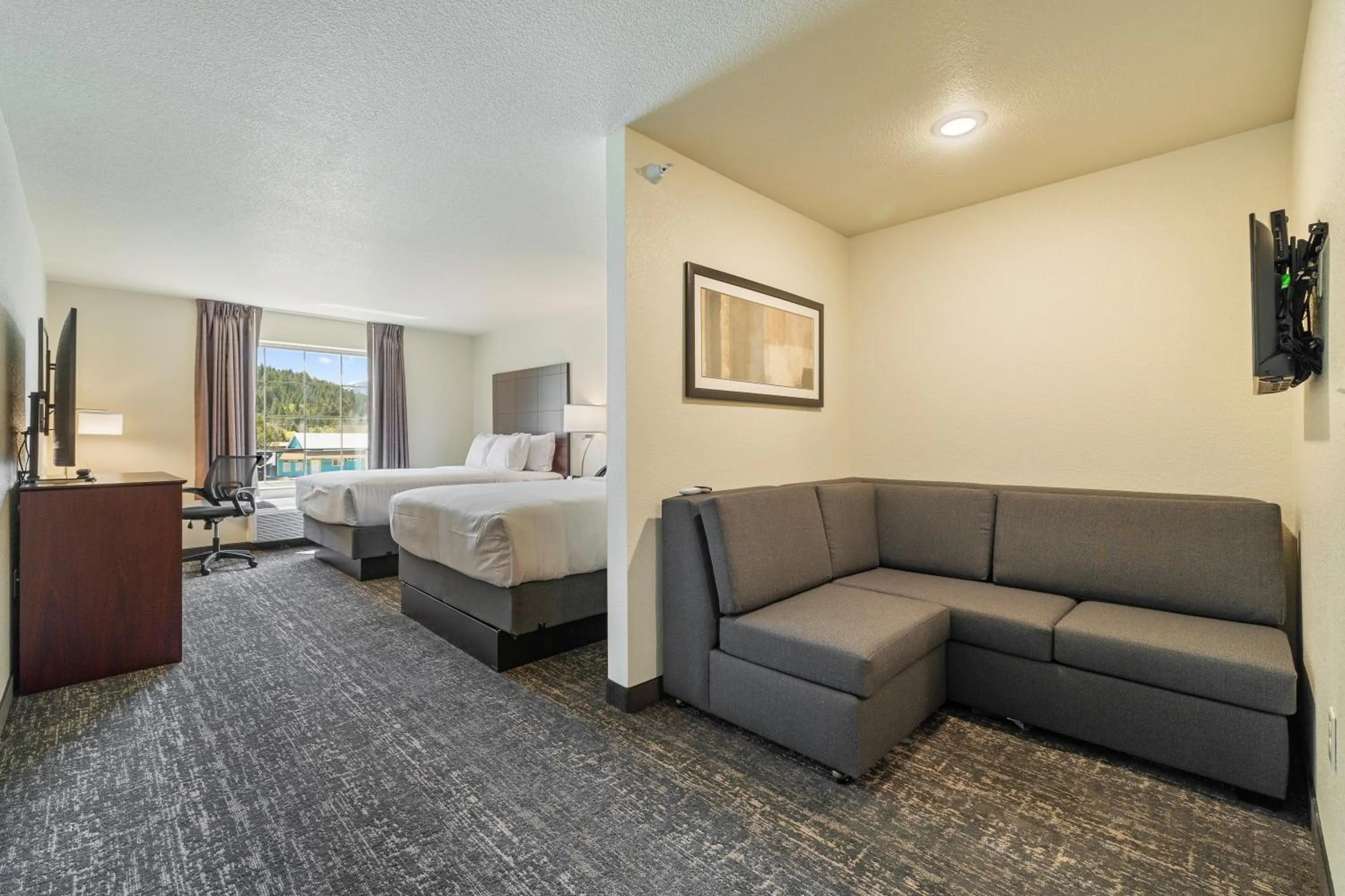 Bed in Cobblestone Hotel & Suites - Alpine