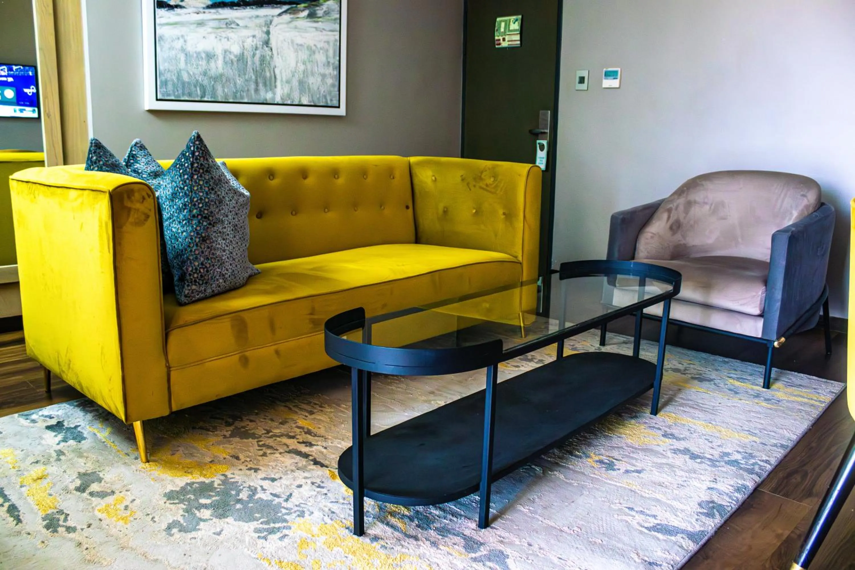 Communal lounge/ TV room in Happy Valley Hotel and Casino