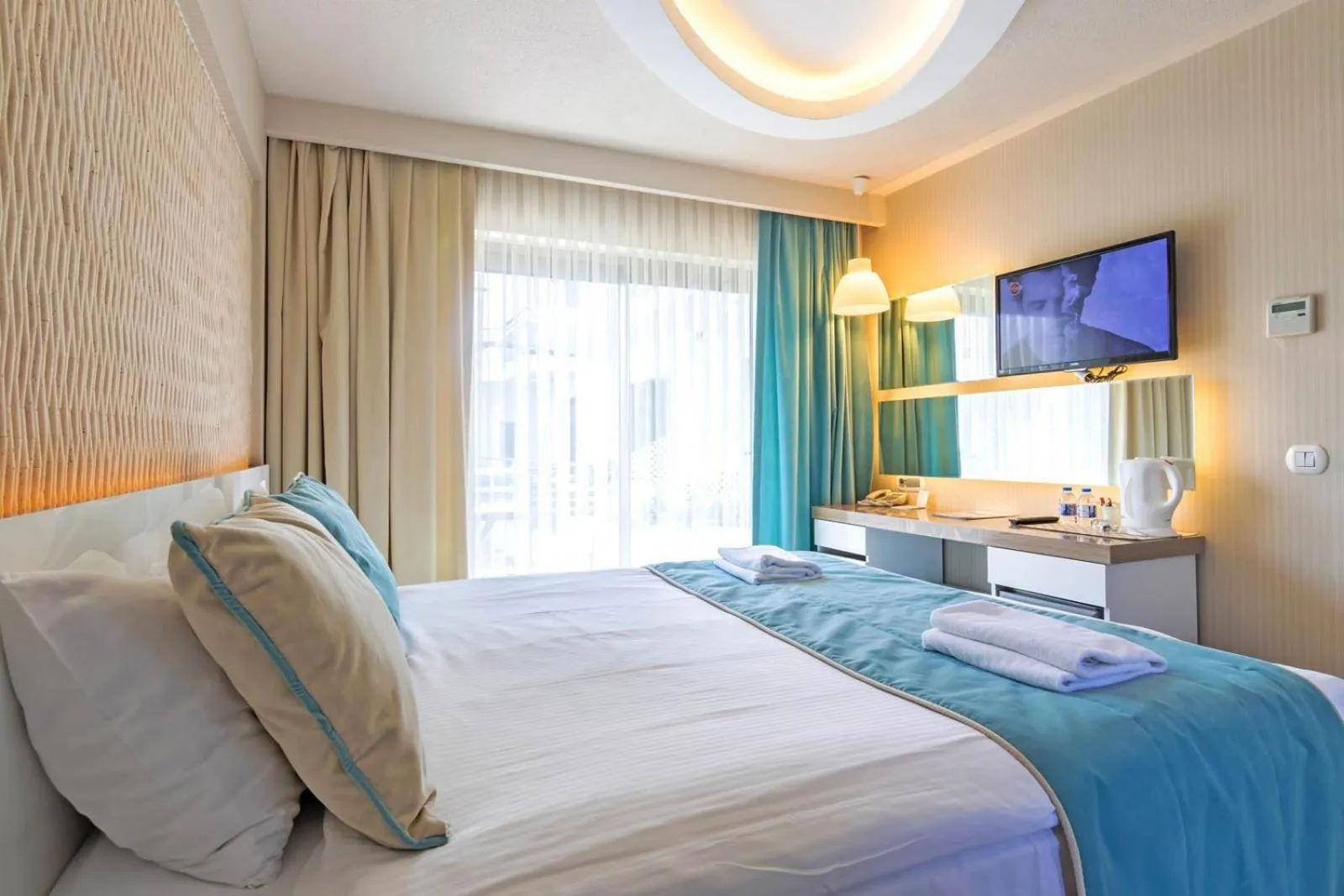 Bed in The D Hotel Çeşme Resort