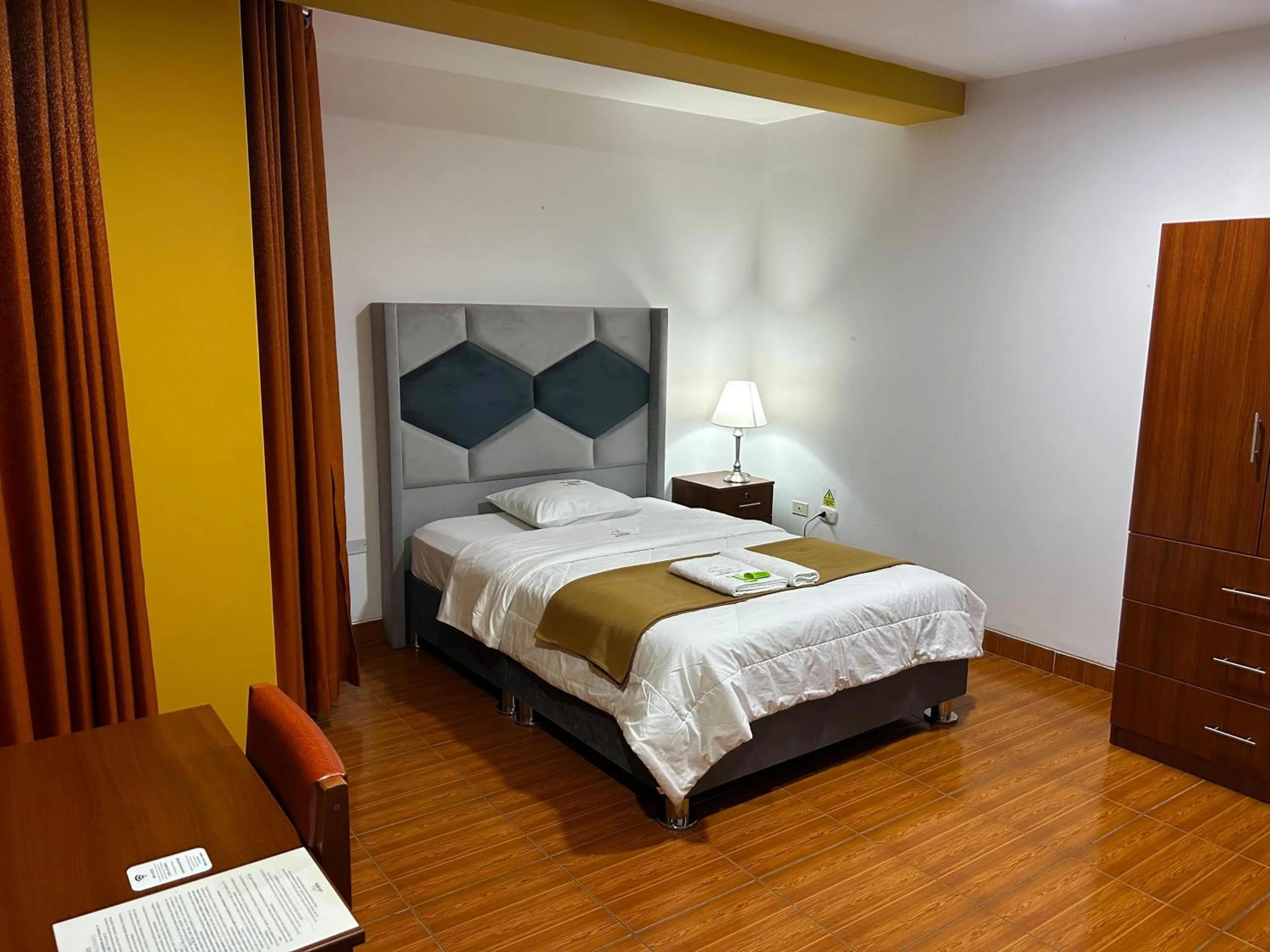 Bed in HOTEL LOS ANDES SUITE