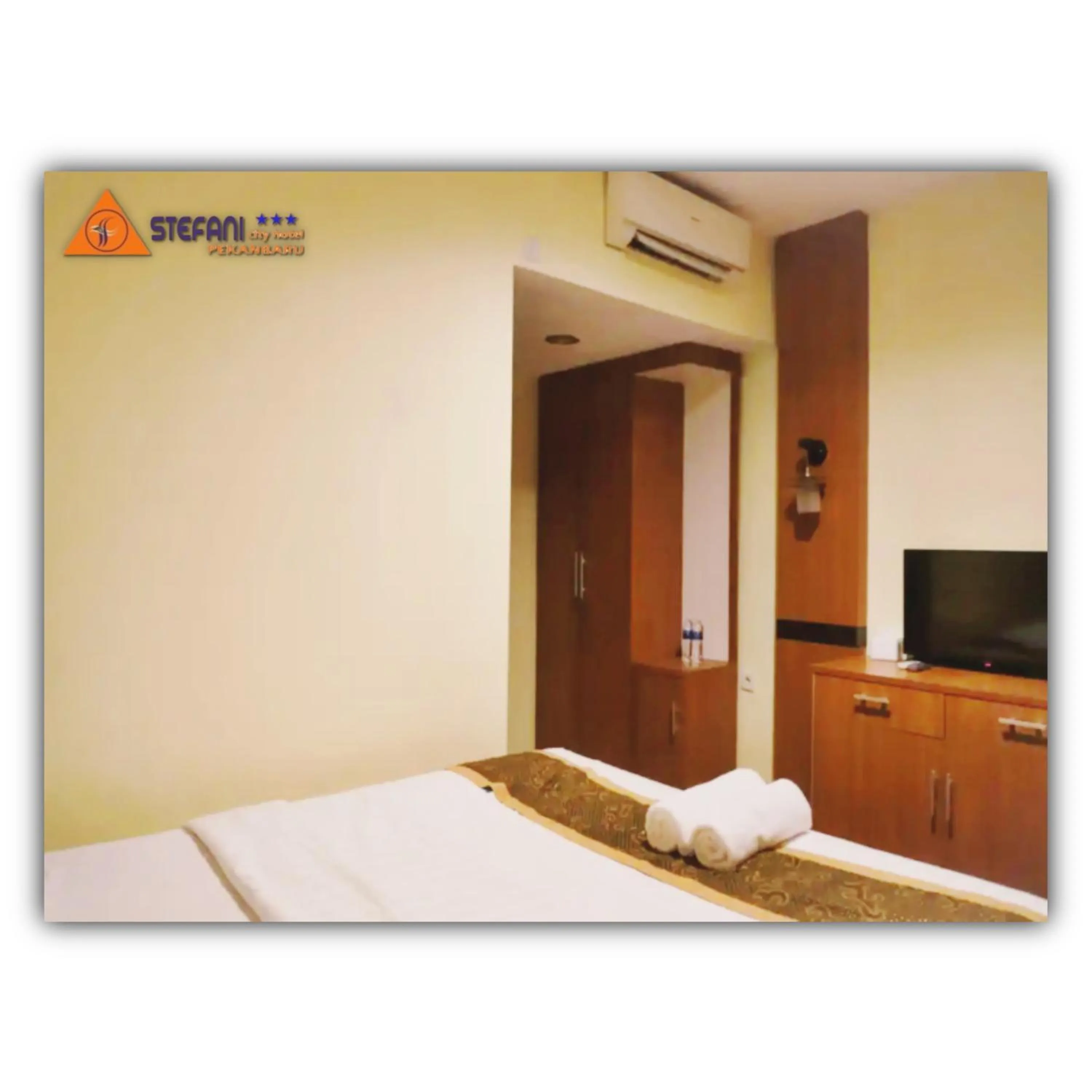 Bed in STEFANI MAKATI HOTEL