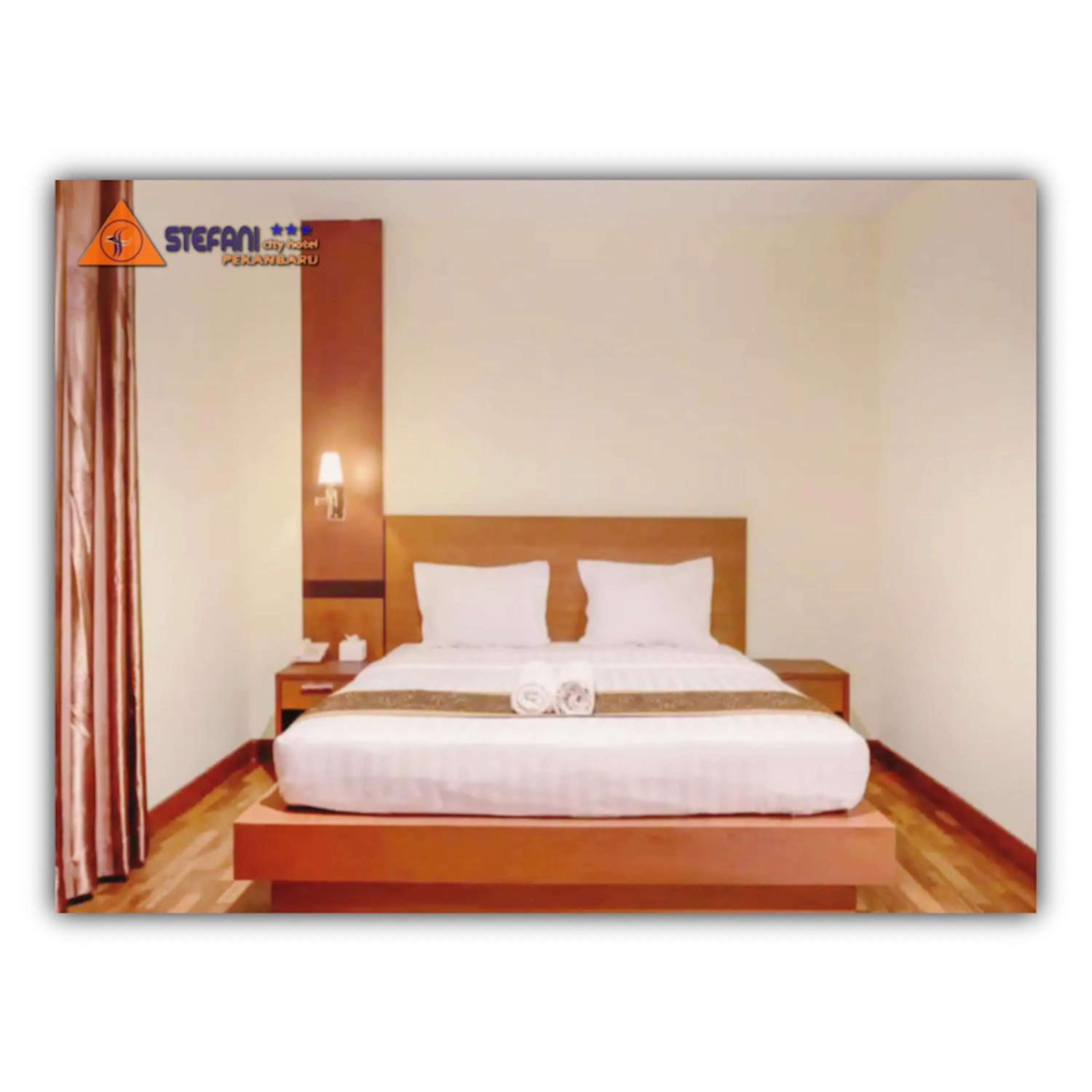 Bed in STEFANI MAKATI HOTEL