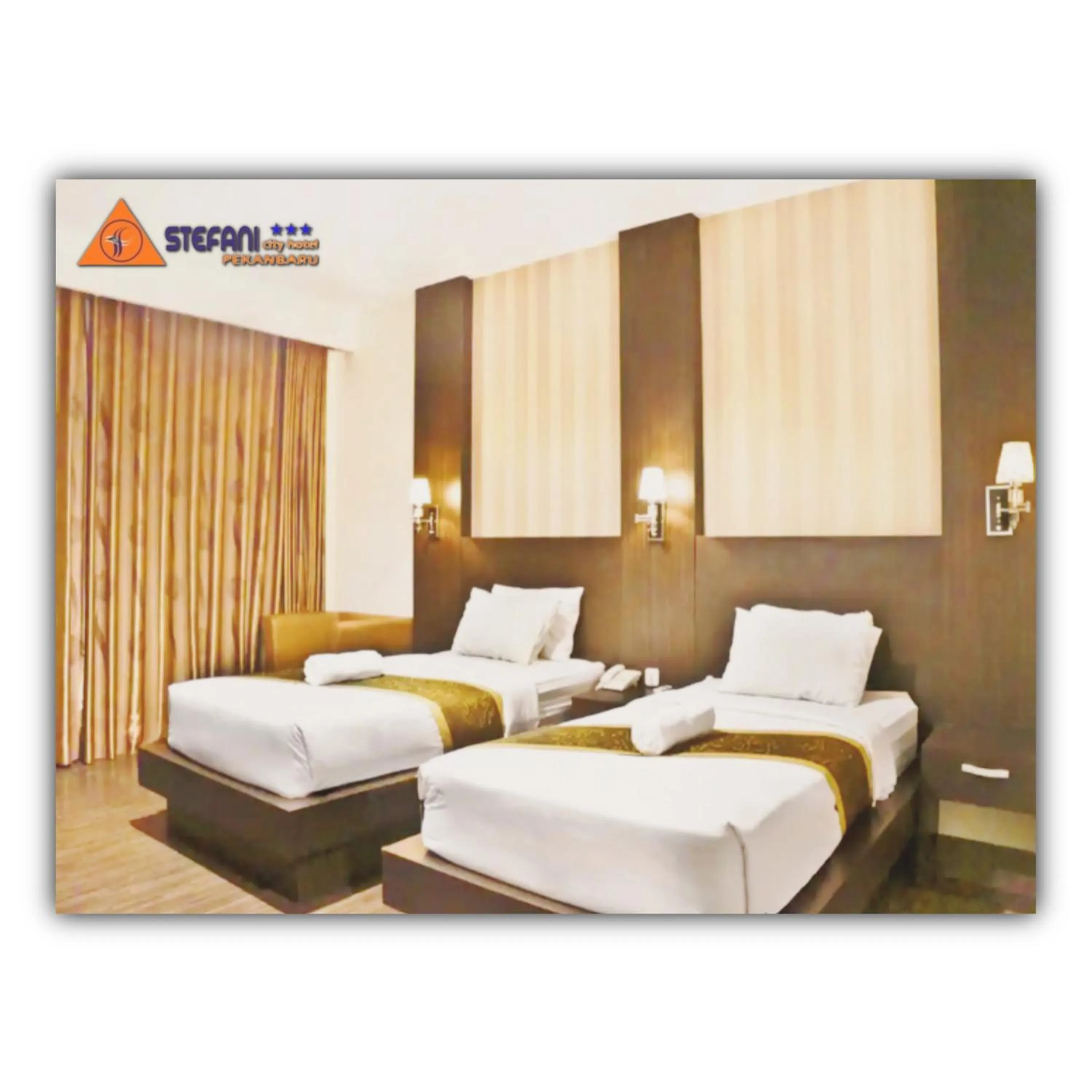 Bed in STEFANI MAKATI HOTEL