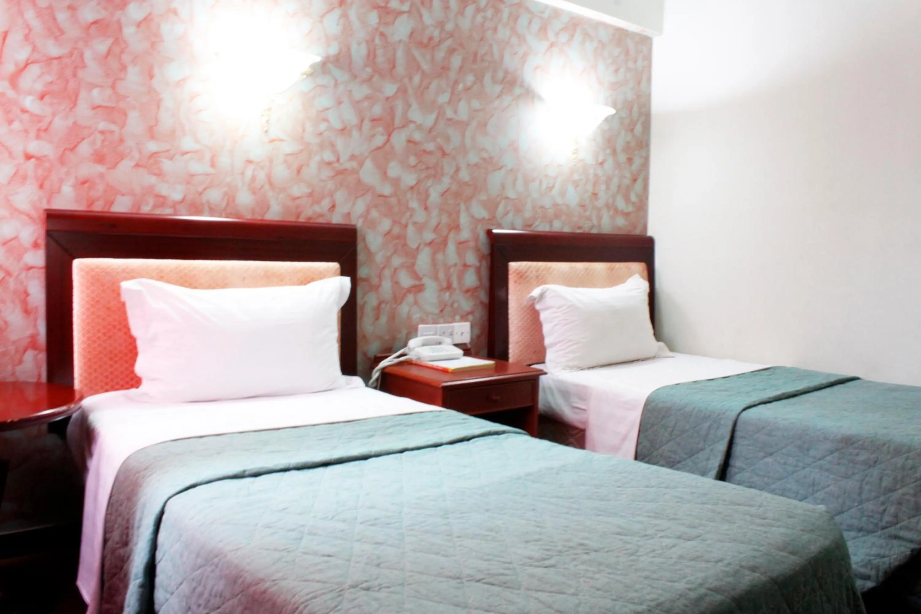 Bed in New Mwanza Hotel