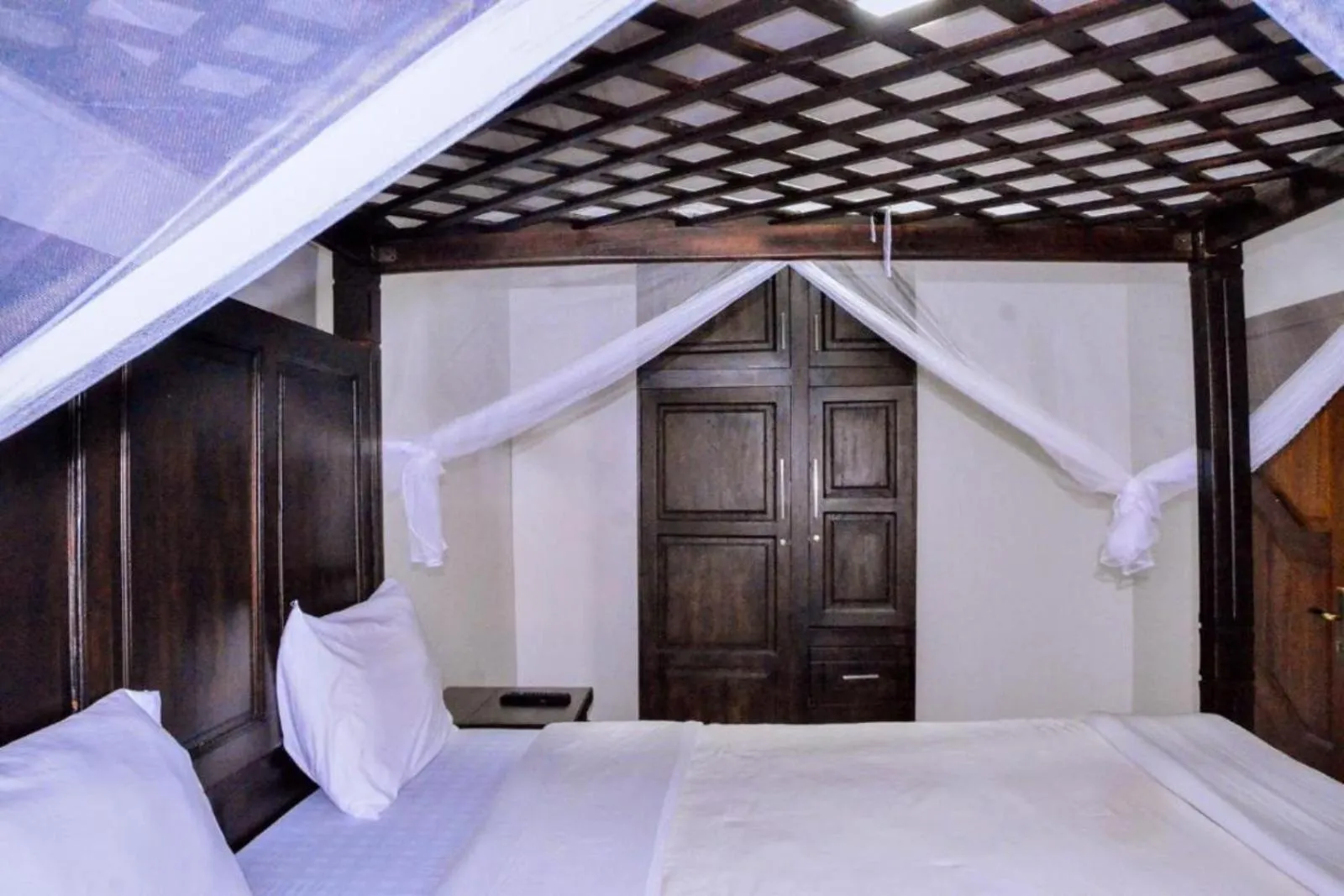 Bed in The Keza Hotel and Apartments