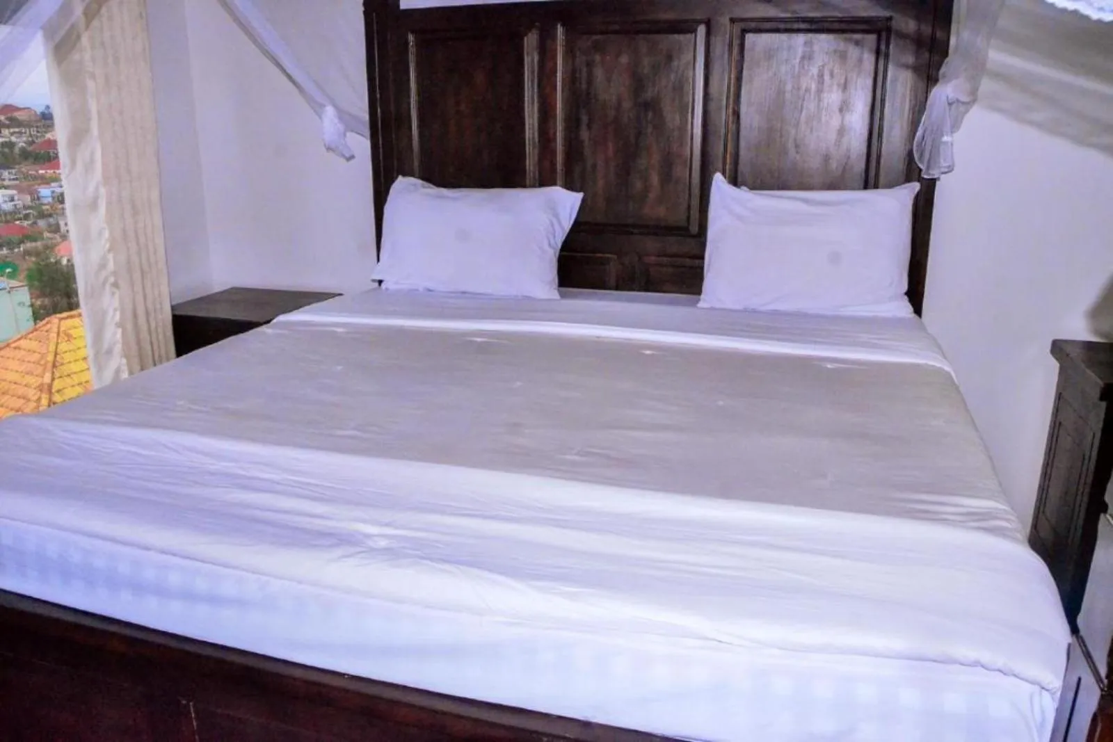 Bed in The Keza Hotel and Apartments