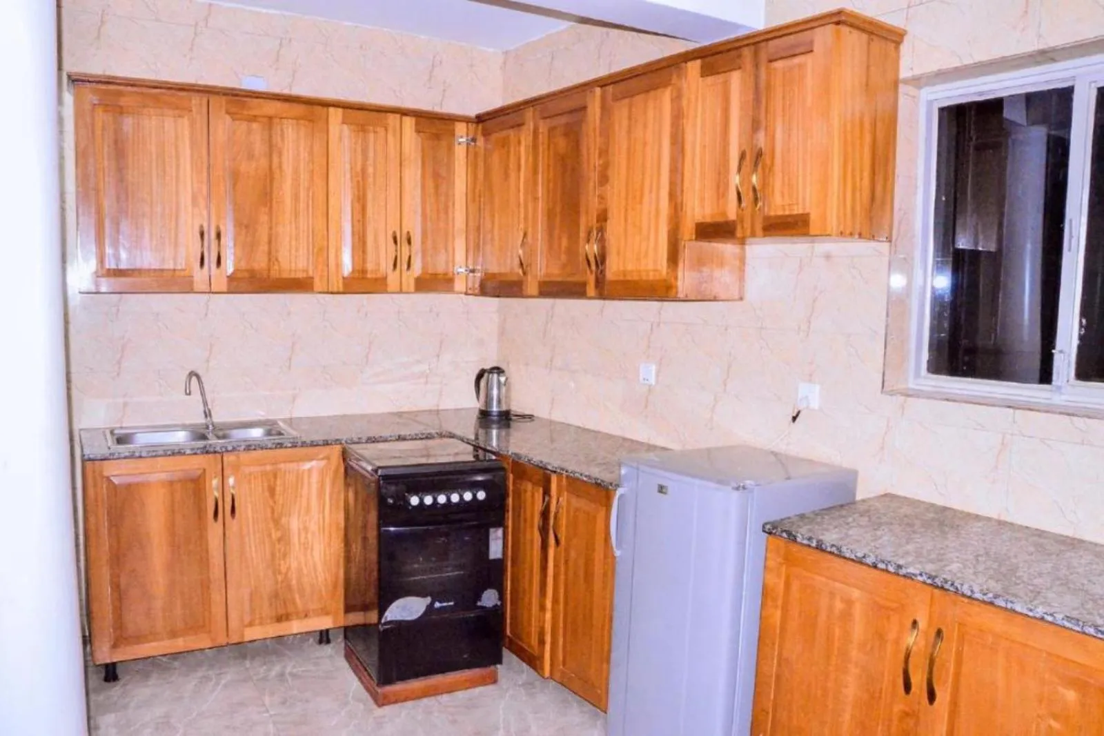 Kitchen or kitchenette in The Keza Hotel and Apartments