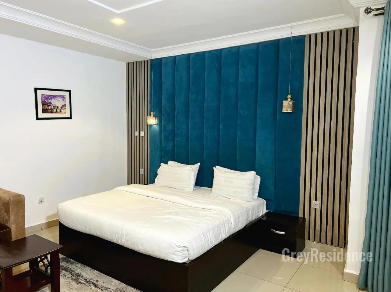 Bed in Grey Residence