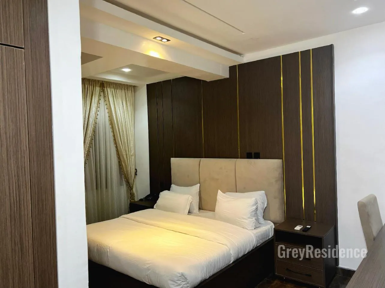 Photo of the whole room, Bed in Grey Residence