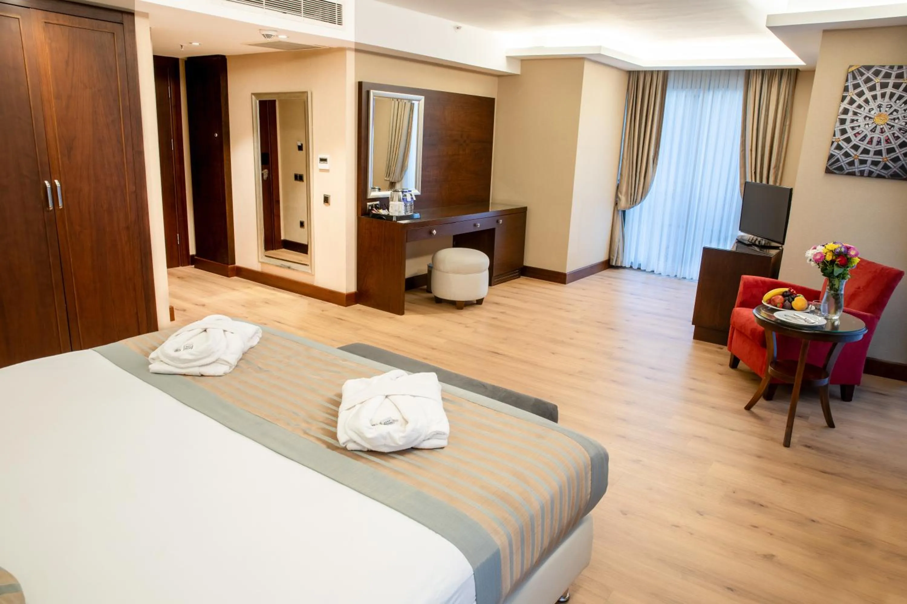 Photo of the whole room, Bed in Grand Aras Hotel & Suites