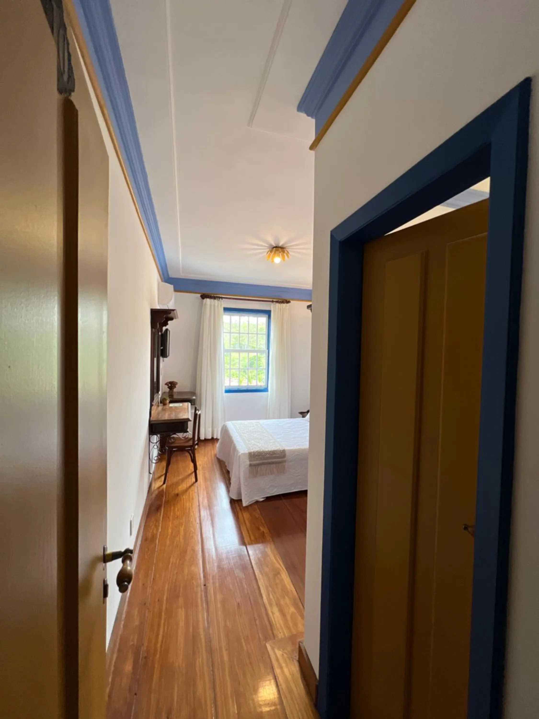 Bed in Pousada Sinhá Olímpia