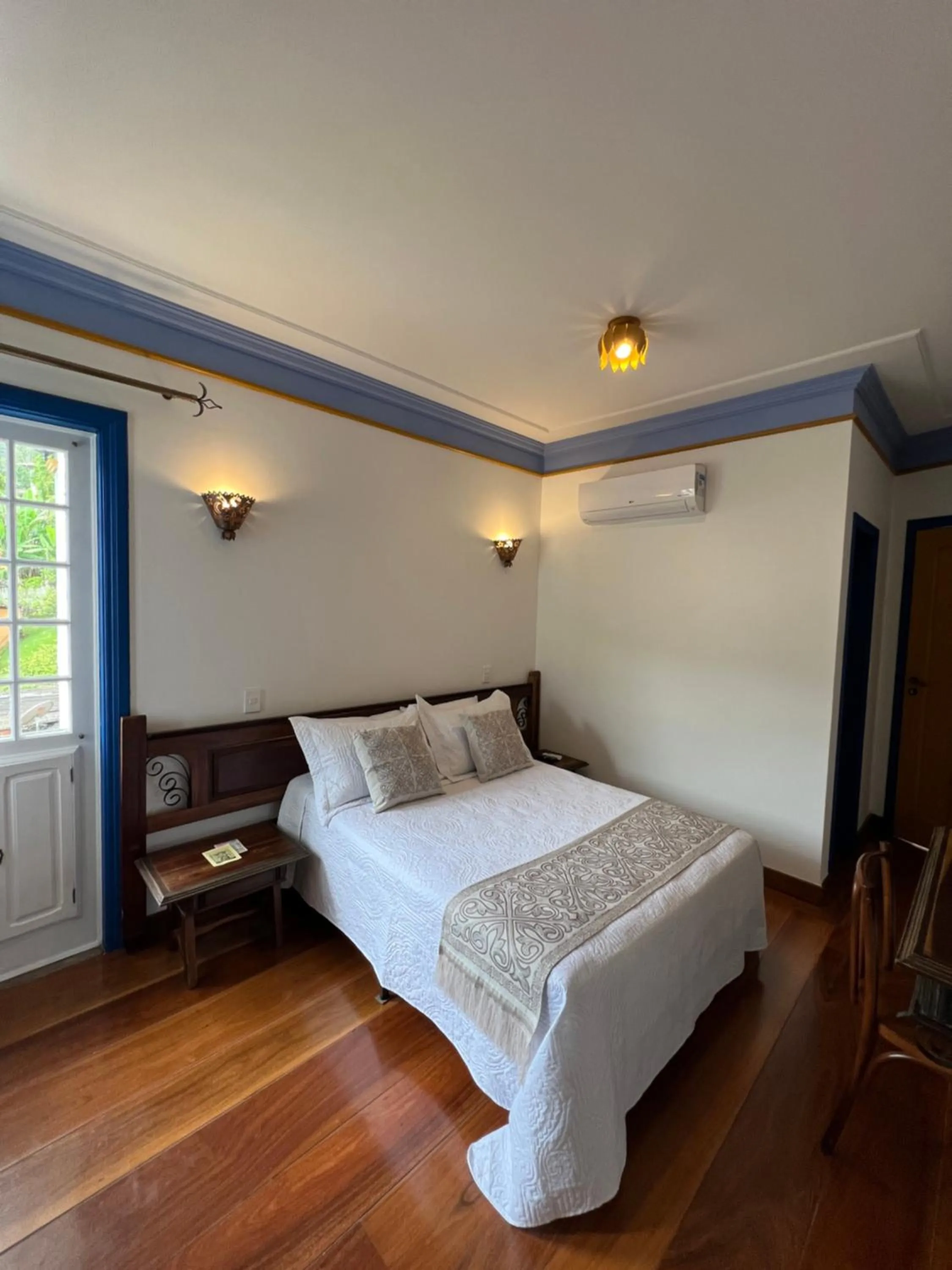 Bed in Pousada Sinhá Olímpia