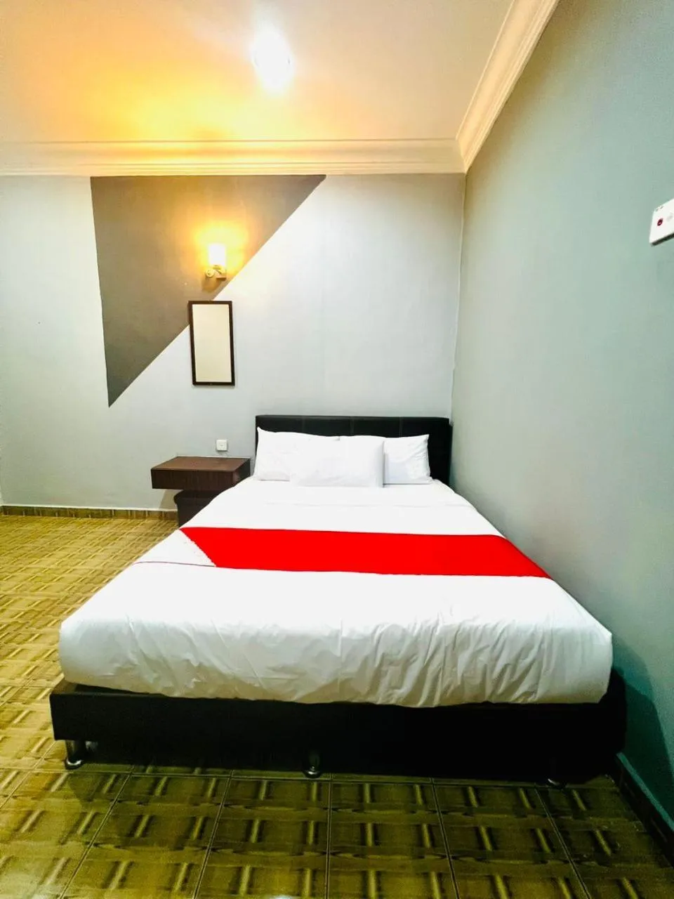 Bed in DAILY INN HOTEL