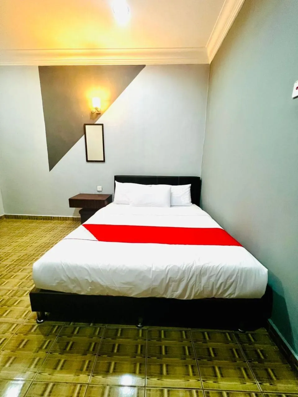 Bed in DAILY INN HOTEL