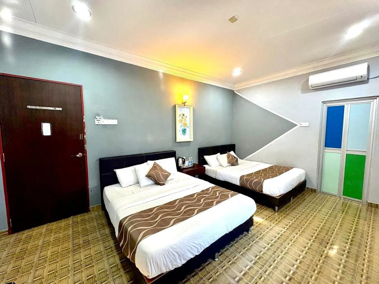 Bed in DAILY INN HOTEL