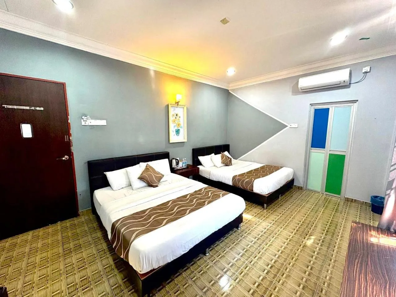 Bed in DAILY INN HOTEL