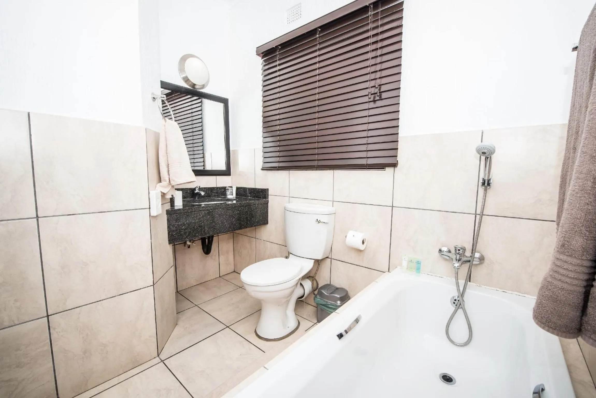 Toilet in First Group Qwantani