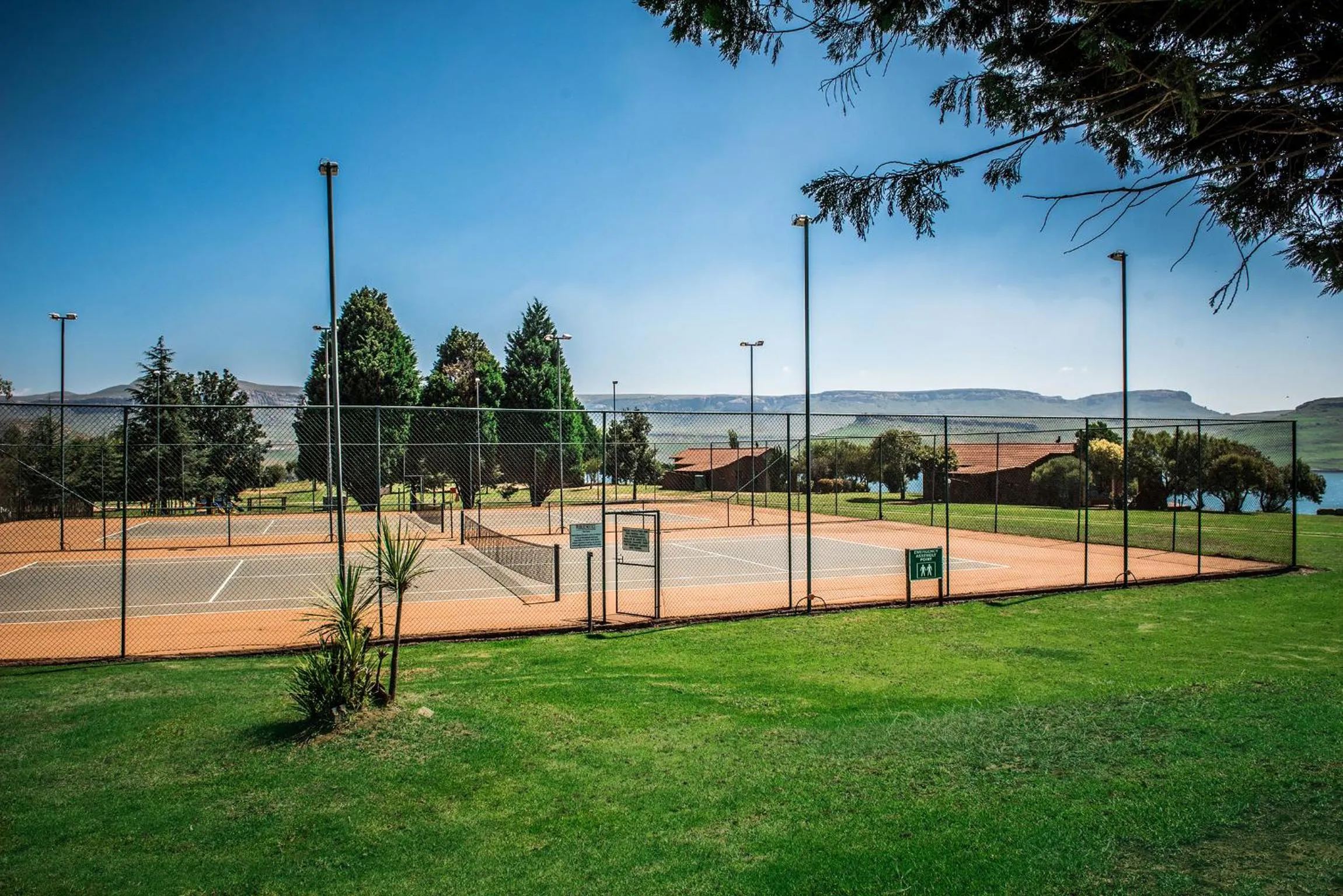 Tennis court in First Group Qwantani