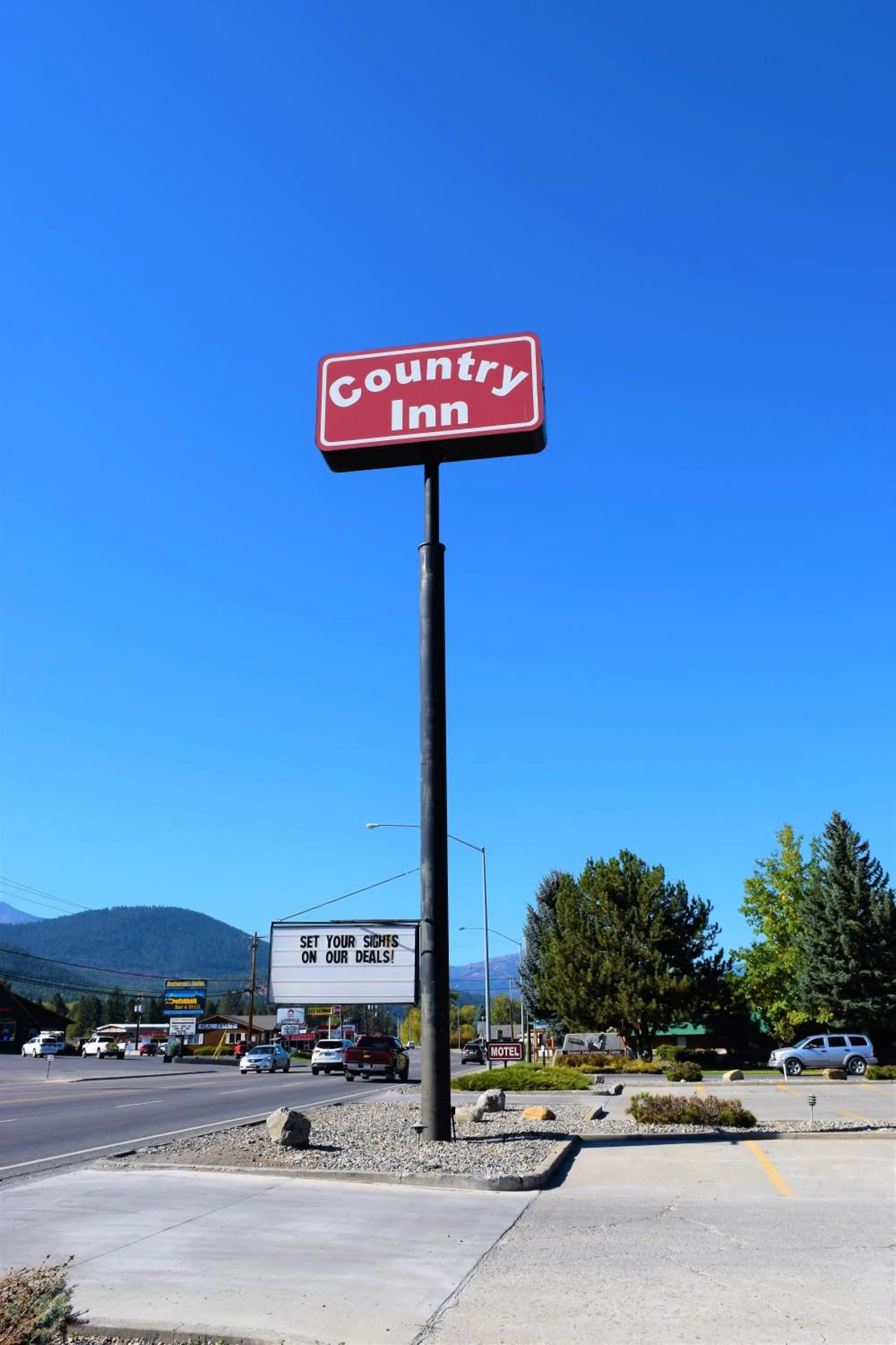 Property logo or sign in Country Inn Libby