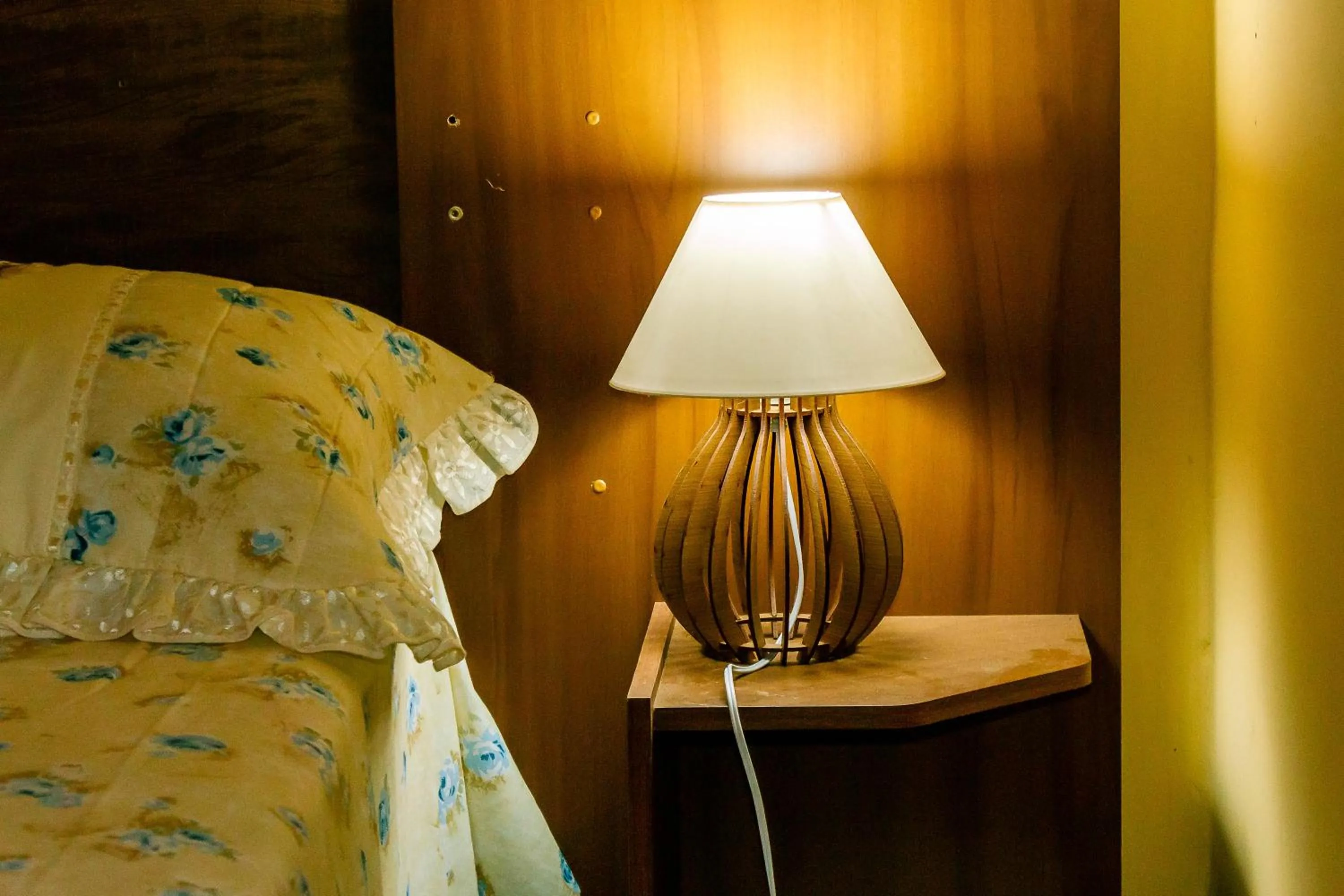 Bed in Pousada Cachoeira da Fumaça