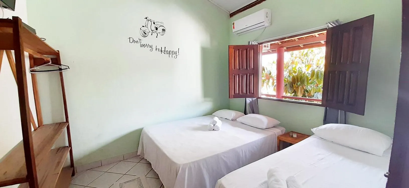 Bed in Pousada Semente